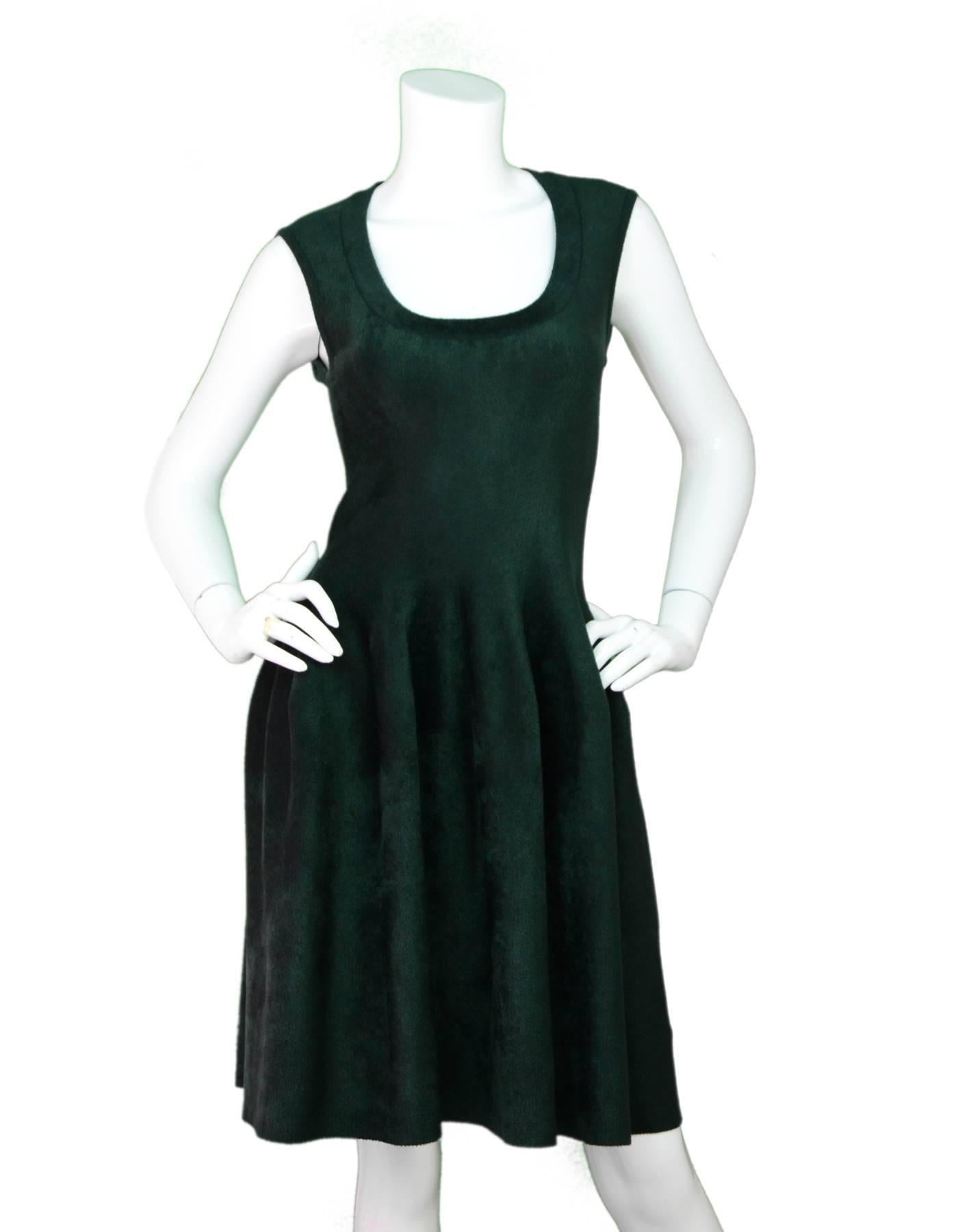 Alaia Green Velvet Fit & Flare Dress Sz FR40

Made in: Italy
Color: Green
Composition: 63% viscose, 37% nylon
Lining: None
Closure/Opening: Back center zip up
Exterior Pockets: None
Interior Pockets: None
Overall Condition: Excellent pre-owned