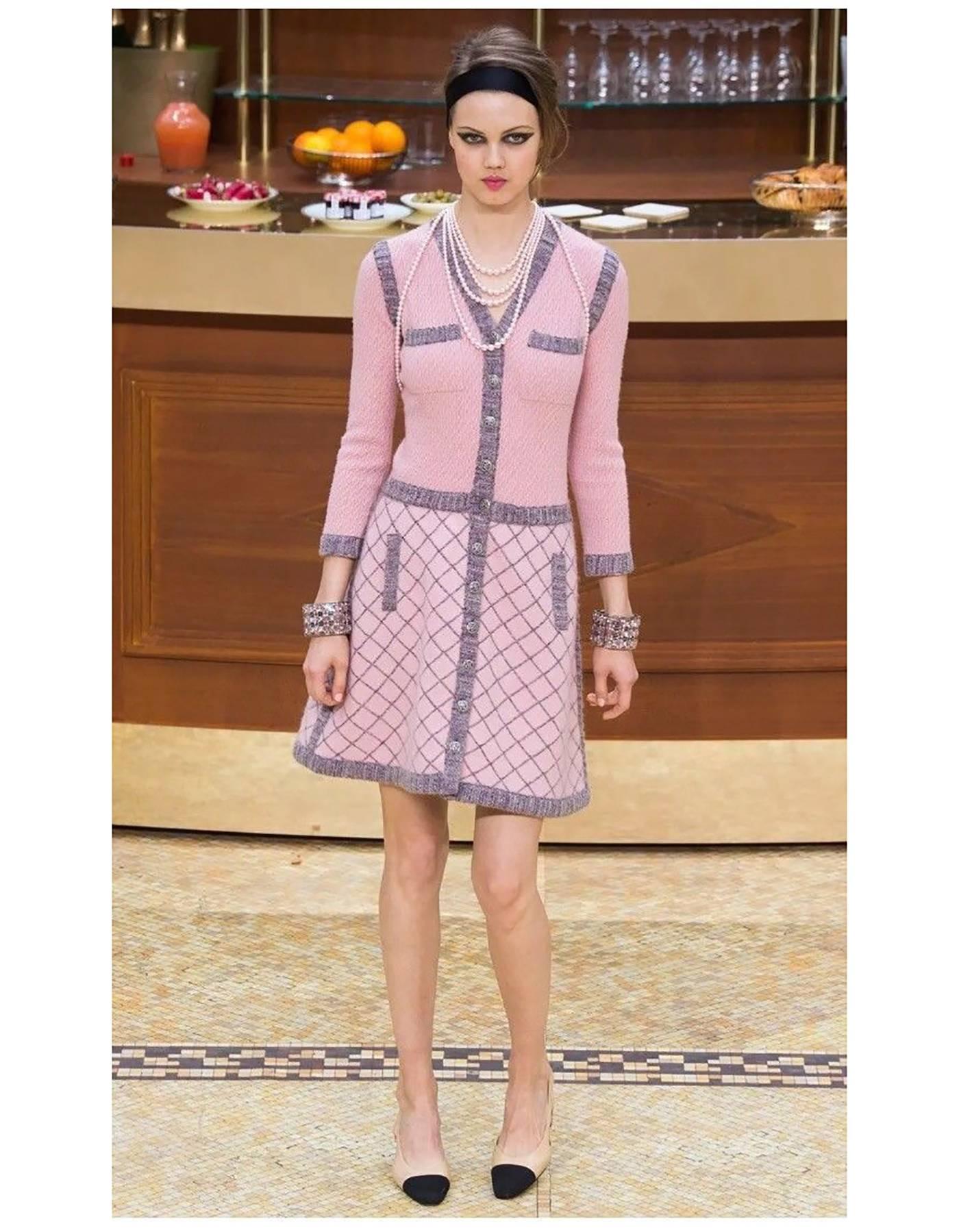 Chanel Pink Silk & Cashmere Sweater Coat Sz FR40

Made In: Italy
Year Of Production: 2015
Color: Pink
Materials: 50% silk, 50% cashmere, 10% mohair
Lining: None
Closure/Opening: Front camellia button closure
Exterior Pockets: Four front