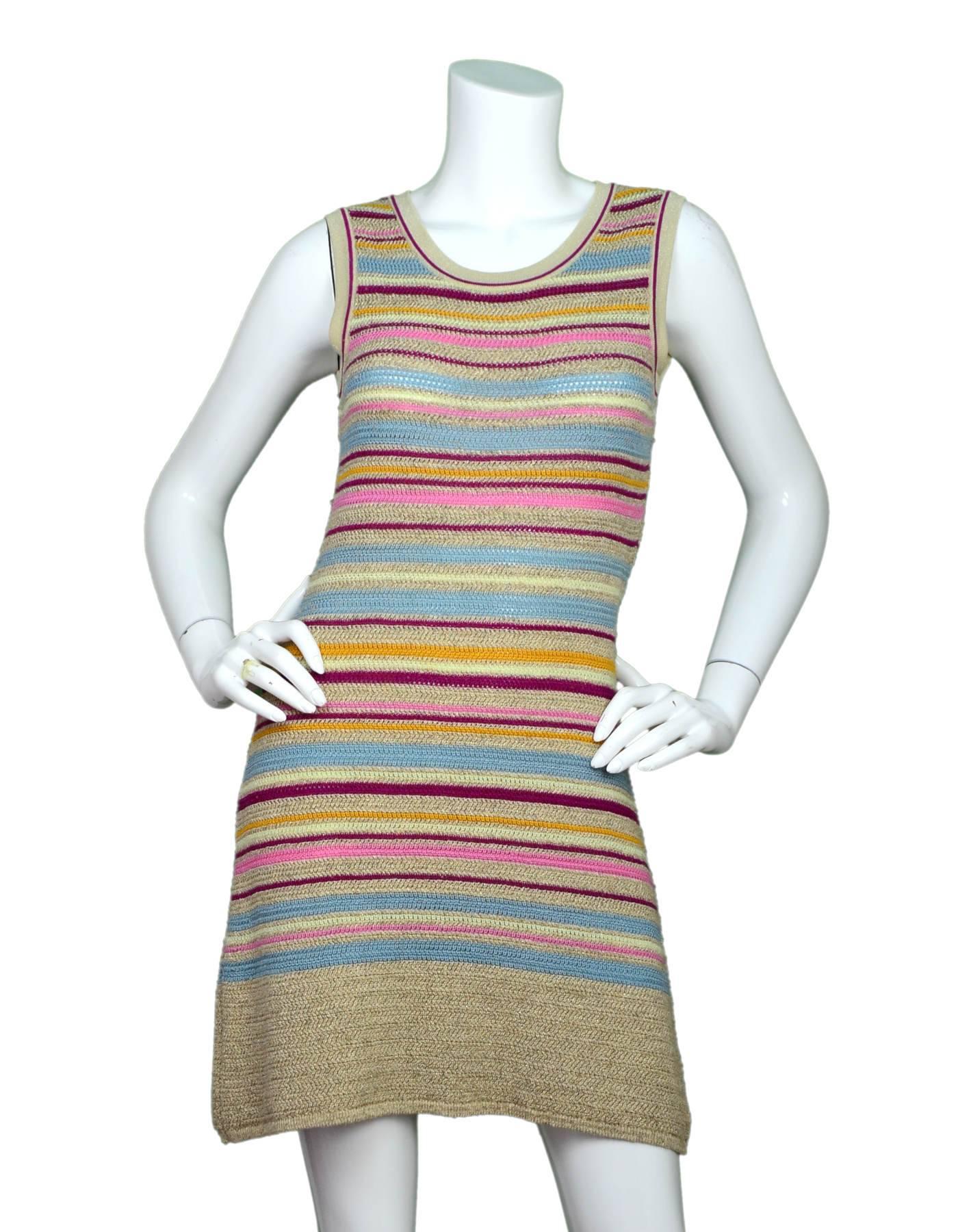 Chanel Tan & Multi-Colored Striped Knit Dress Sz FR36

Features metallic threading throughout

Made In: France
Year Of Production: 2011 cruise
Color: Tan, pink, blue
Composition: 95% cotton, 5% rayon
Lining: None
Closure/Opening: Pull over with