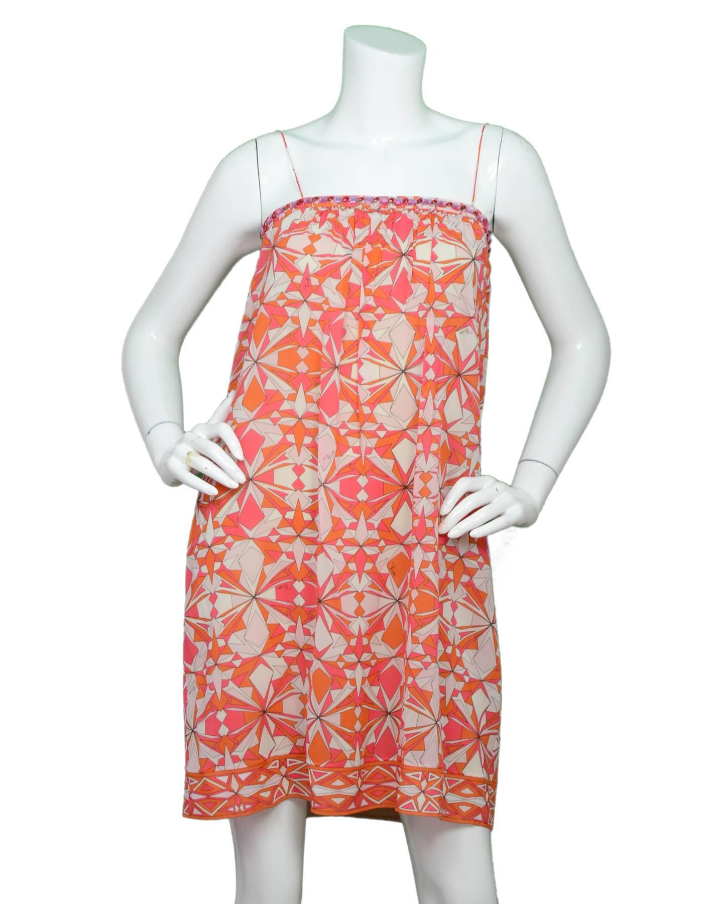 Emilio Pucci Silk Orange Print Dress Sz 4

Features beading at bust and spaghetti straps

Made In: Italy
Color: Orange, white
Composition: 92% Silk, 8% elastane
Lining: Nude slip
Closure/Opening: Stretch bust
Overall Condition: Excellent pre-owned