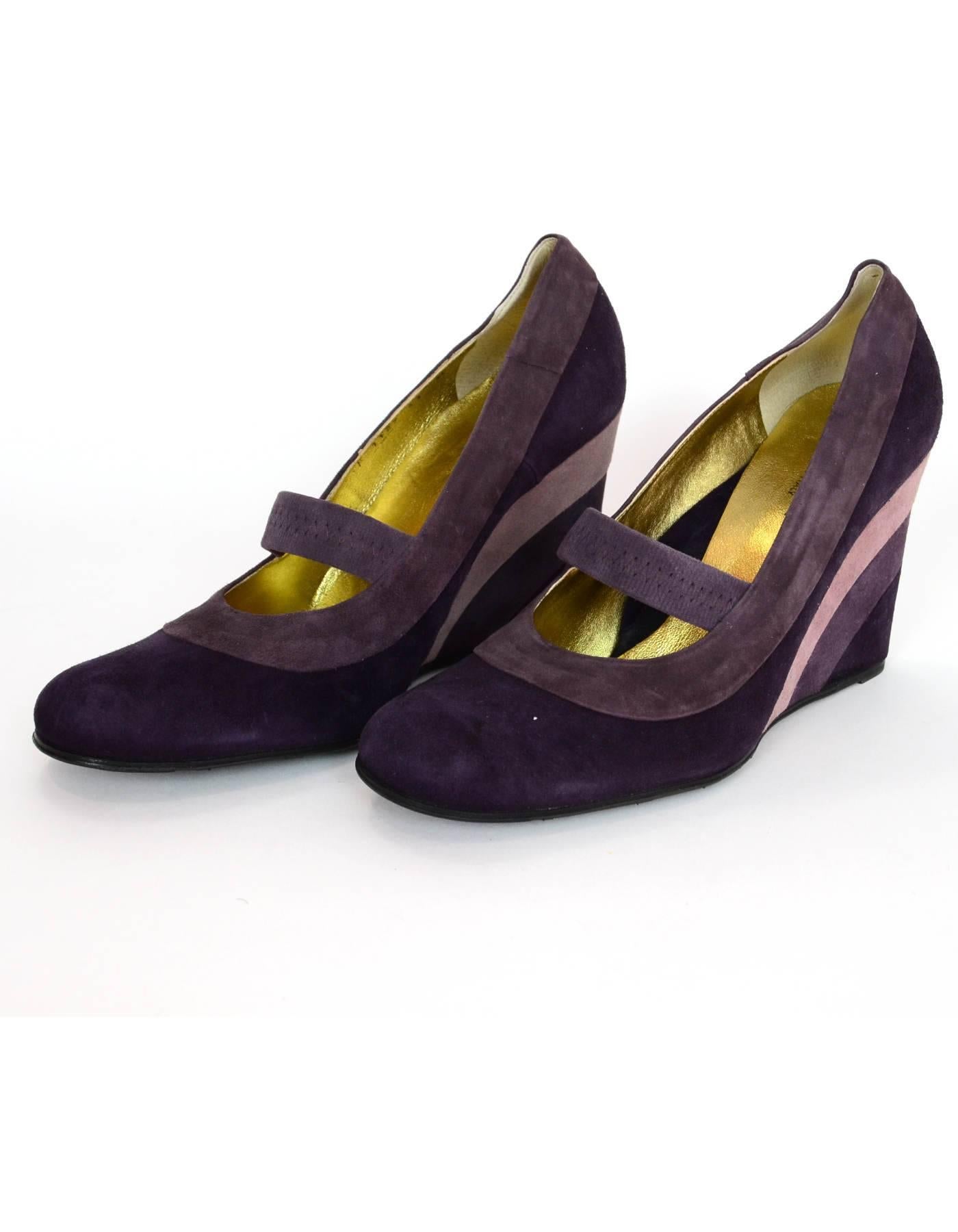 Taryn Rose Purple Tri-Color Suede Mary Jane Wedges Sz 41 NIB

Made In: Italy
Color: Purple
Materials: Suede
Closure/Opening: Slide on
Sole Stamp: Taryn Rose vero cuoio Made in Italy 41
Overall Condition: Excellent pre-owned condition
Included: Taryn