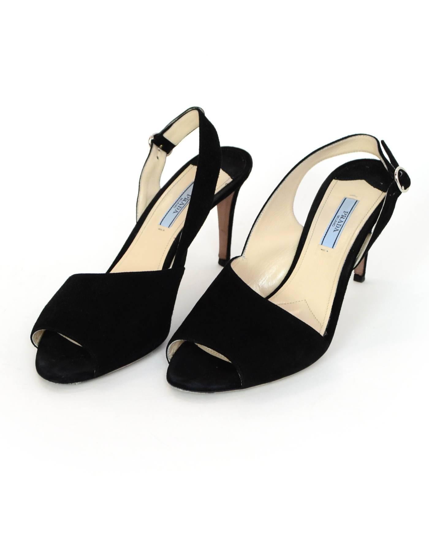Prada Black Suede d'Orsay Open-Toe Pumps Sz 39.5

Made In: Italy
Color: Black
Materials: Suede
Closure/Opening: Sling back
Sole Stamp: Prada 39.5 Made in Italy
Retail Price: $690 + tax
Overall Condition: Excellent pre-owned condition with the