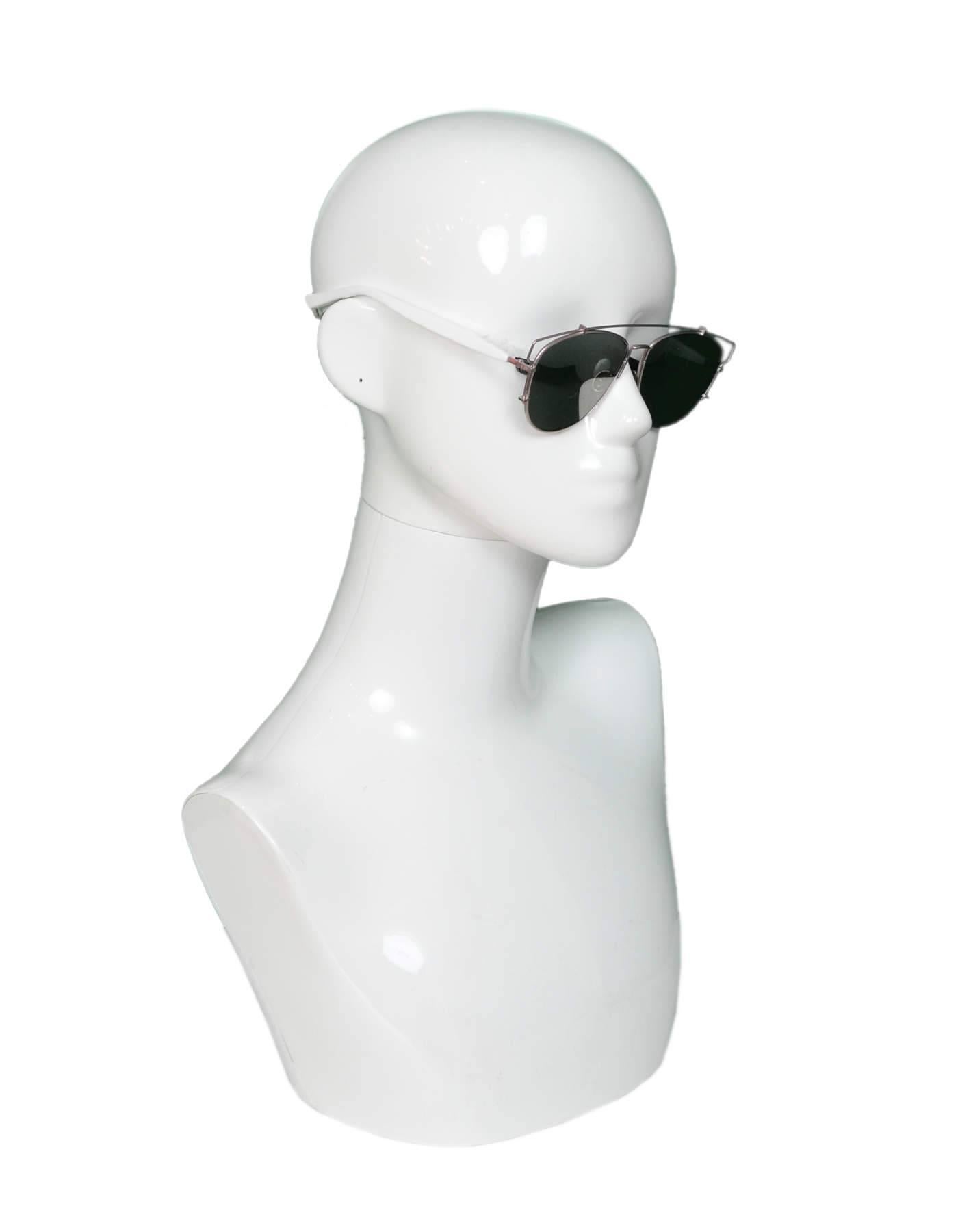 Christian Dior White & Pink Technologic Sunglasses

 Made In: Italy
Color: White, pink
Materials: Metal, resin
Retail Price: $635 + tax
Overall Condition: Excellent pre-owned condition with the exception of some marks throughout
Includes: Christian