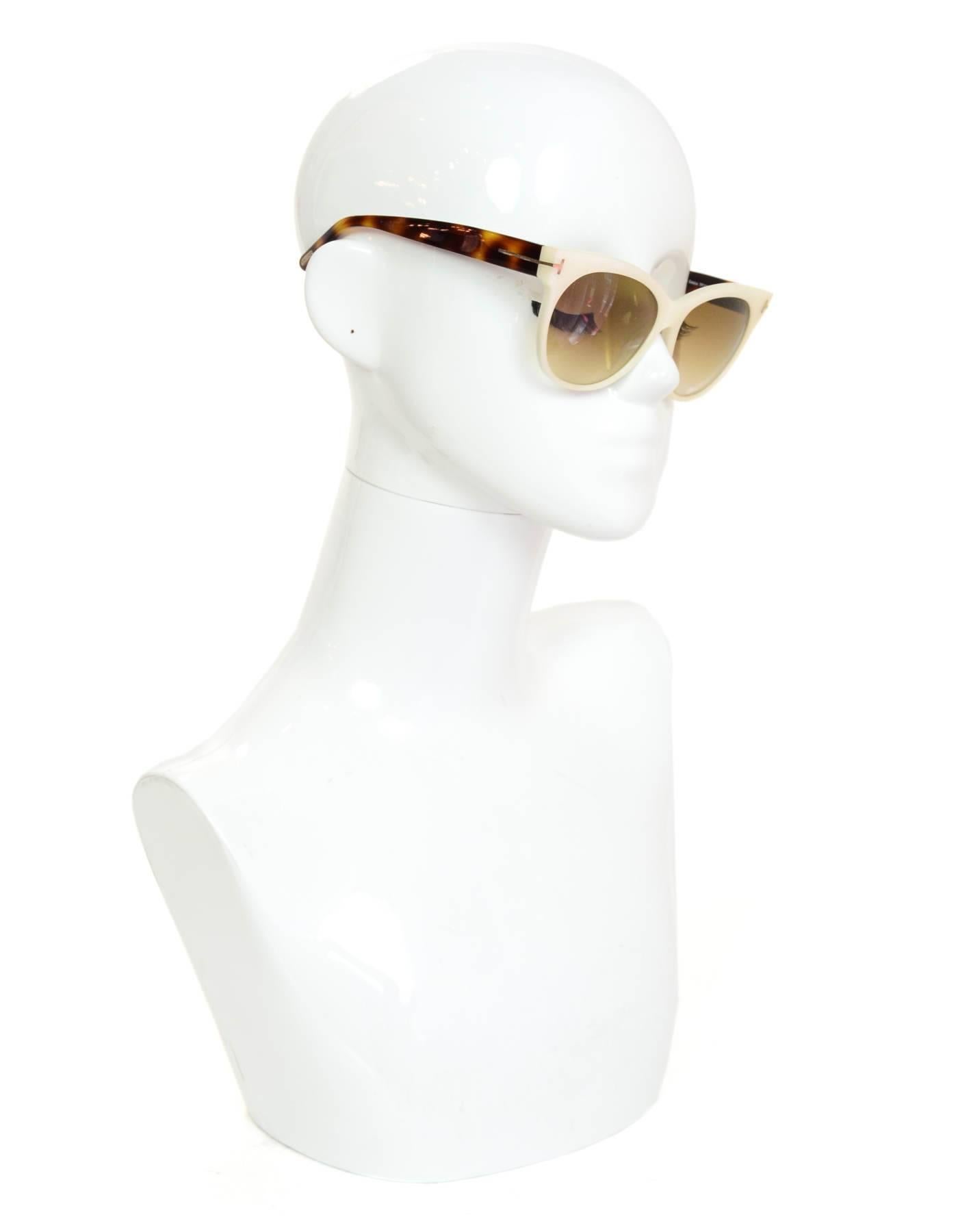 Tom Ford Ivory & Tortoise Saskia Sunglasses

Made In: Italy
Color: Ivory, brown
Materials: Resin
Overall Condition: Excellent pre-owned condition with the exception of light surface marks
Includes: Tom Ford case

Measurements:
Length Across:
