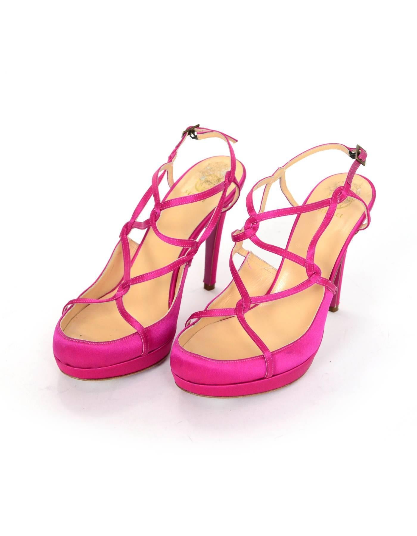 Versace Pink Satin Strappy Sandals Sz 37

Made In: Italy
Color: Pink
Materials: Satin
Closure/Opening: Buckle closure at ankle
Sole Stamp: Vero cuoio made in Italy 37
Overall Condition: Very good pre-owned condition wth the exception of some wear at