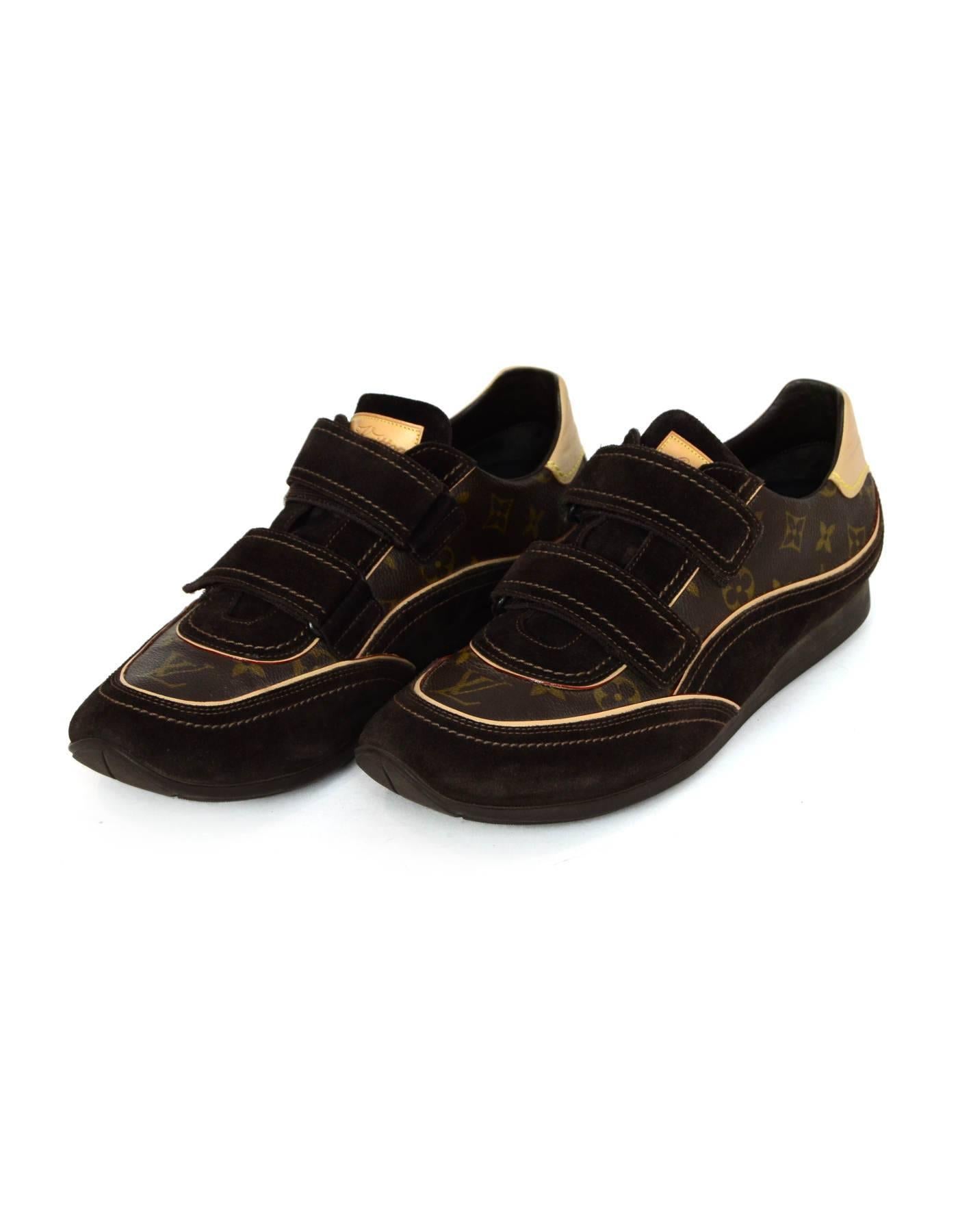 Louis Vuitton's Men's Monogram Speeding Velcro Sneakers Sz 11

Made In: Italy
Color: Brown
Materials: Coated canvas, suede, vachetta leather
Closure/Opening: Velcro closure
Sole Stamp: Louis Vuitton made in Italy
Retail Price: $470 + Tax
Overall