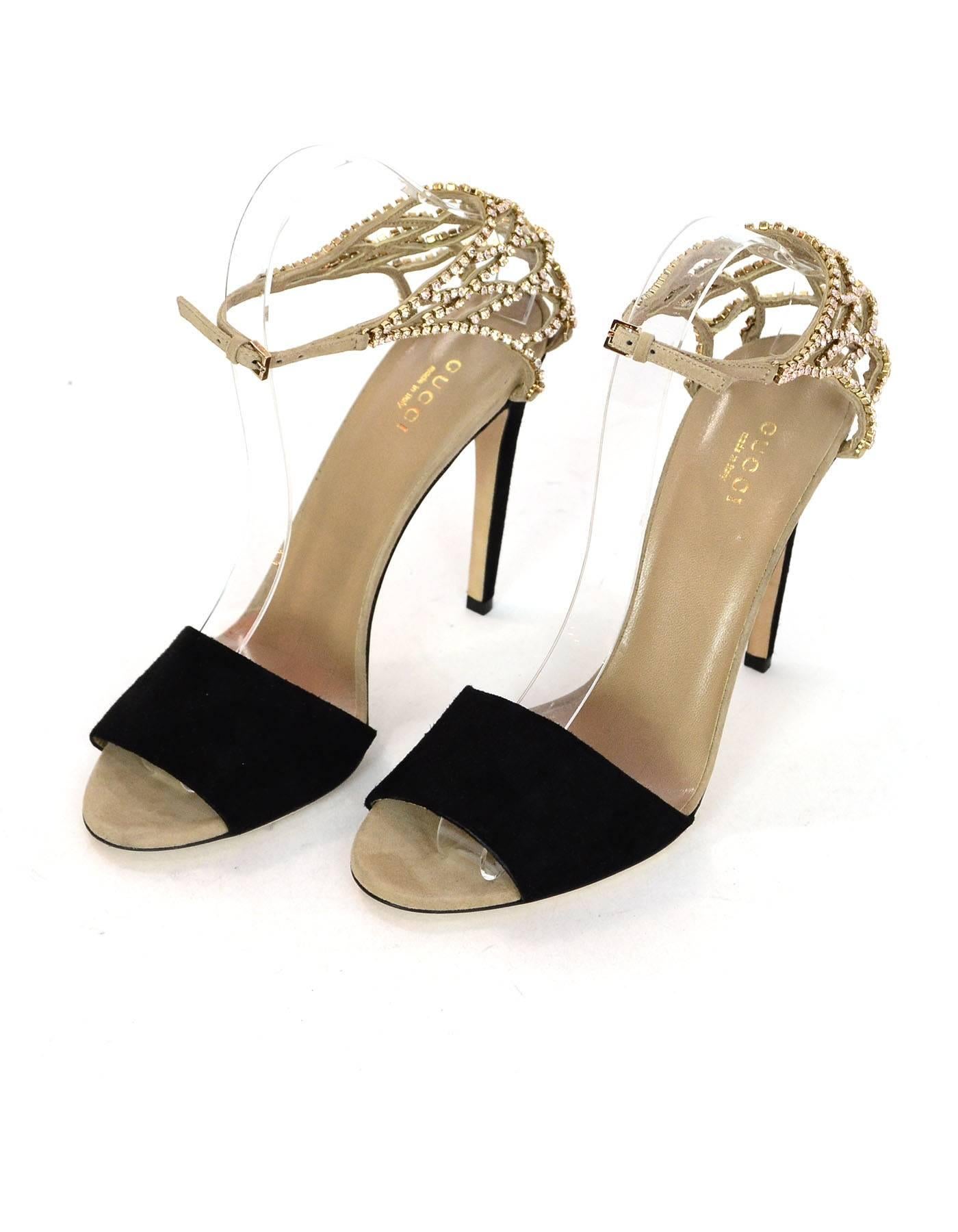 Gucci Black & Beige Suede & Crystal Sandals Sz 39 NEW

Made In: Italy
Color: Black, beige
Materials: Suede, crystal
Closure/Opening: Buckle closure at ankle
Sole Stamp: Gucci Made in Italy 39
Retail Price: $1,150 + tax
Overall Condition: Excellent