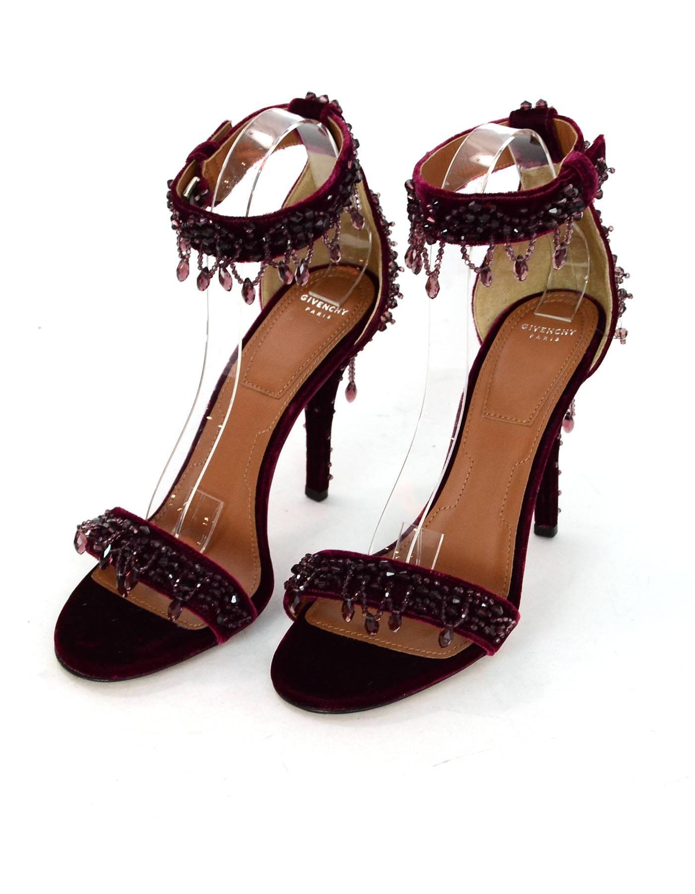 Givenchy Burgundy Velvet Beaded Infinity Sandals Sz 39 NEW

Made In: Italy
Color: Burgundy
Materials: Velvet, beads
Closure/Opening: Buckle closure at ankle strap
Sole Stamp: Givenchy 39 made in italy
Overall Condition: Excellent pre-owned condition