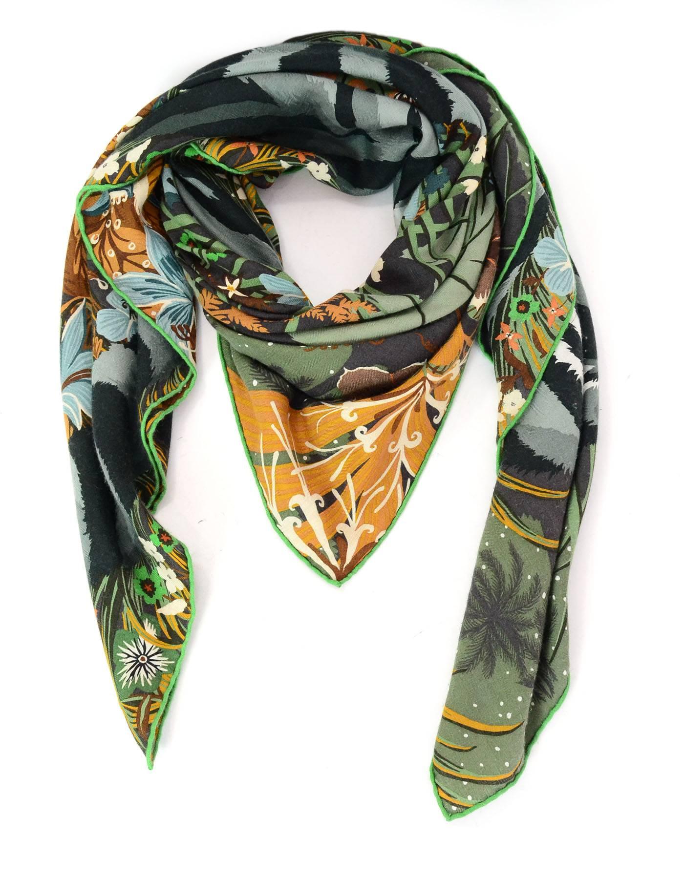 Hermes Green & Brown Tyger Tyger Cashmere & Silk 140cm Shawl
Design is in tribute to William Blake's poem The Tyger

Made In: France
Color: Brown, green
Composition: 70% cashmere, 30% silk
Retail Price: $1,100 + tax
Overall Condition: Very good