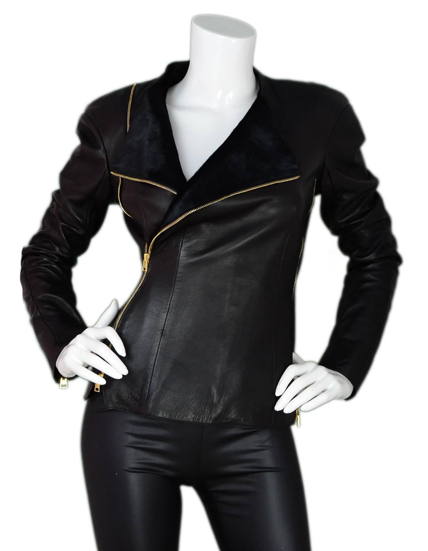 Tom Ford Black Leather & Calf Hair Jacket Sz IT 38

Made In: Italy
Color: Black
Composition: 100% leather
Lining: Black textile
Closure/Opening: Zip closure
Overall Condition: Excellent pre-owned condition
Marked Size: IT38 / US 0
Shoulders: