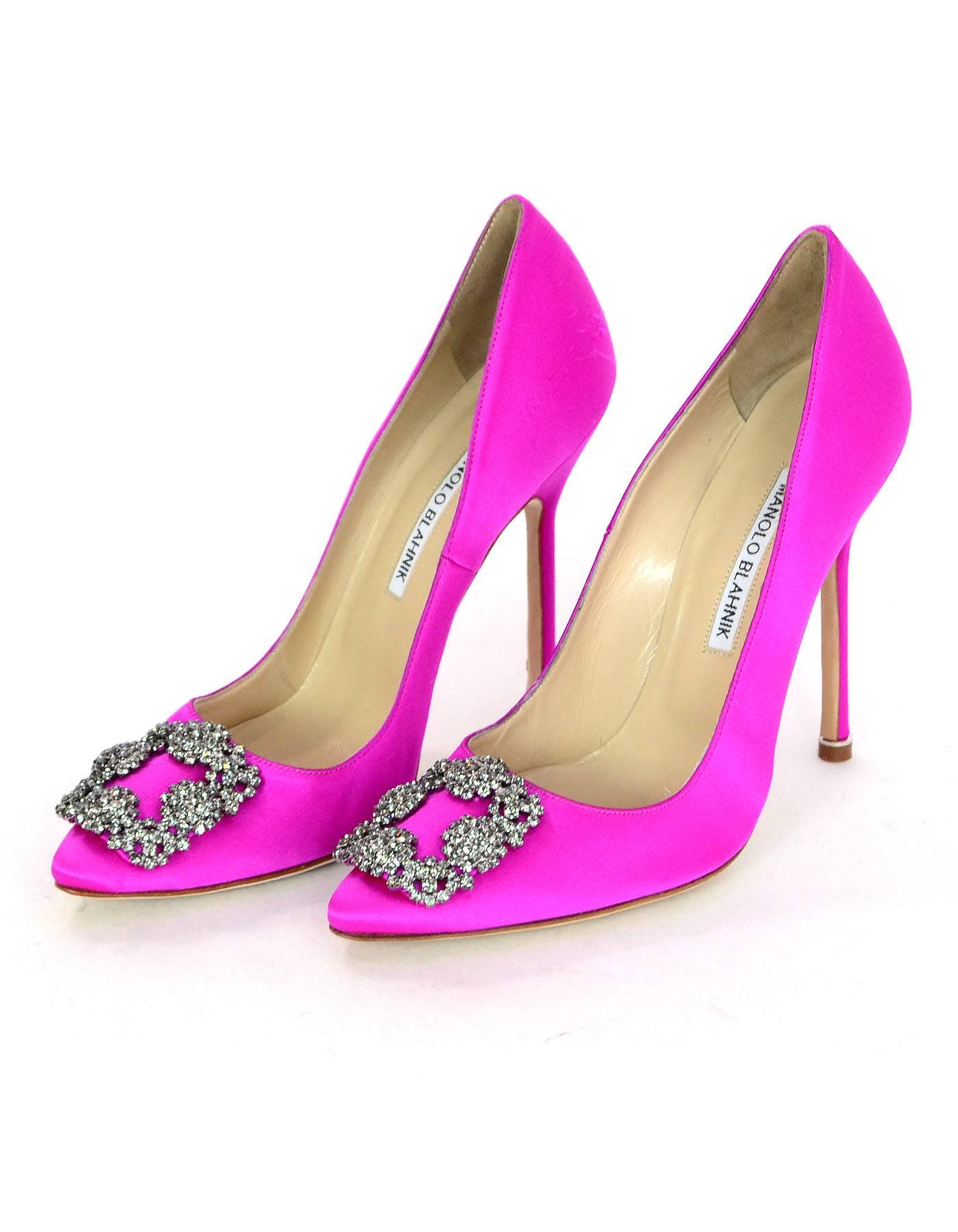 Manolo Blahnik Neon Pink Satin Hangisi 115mm Pumps Sz 38

Made In: Italy
Color: Neon pink
Materials: Satin, crystal
Closure/Opening: Slide on
Sole Stamp: Manolo Blahnik Made in Italy 38
Retail Price: $995 + tax
Overall Condition: Excellent pre-owned