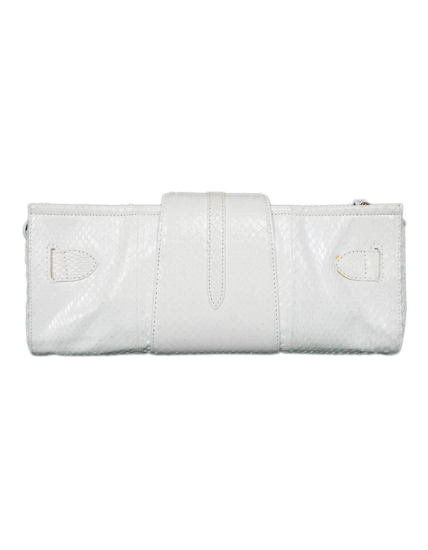 Jimmy Choo White Python Tulita Clutch

Made In: Italy
Color: White
Hardware: Goldtone
Materials: Python, metal
Lining: Tan textile
Closure/Opening: Zip top with flap and tab closure
Exterior Pockets: None
Interior Pockets: Zip wall pocket, wall