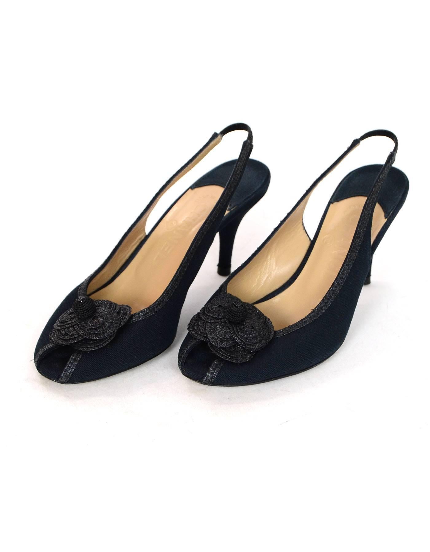 Chanel Black Canvas Peep-Toe Slingback Pumps Sz 38

Made In: Italy
Color: Black
Materials: Canvas
Closure/Opening: Slingback strap
Sole Stamp: CC Made in Italy 38
Overall Condition: Excellent pre-owned condition with the exception of some wear at