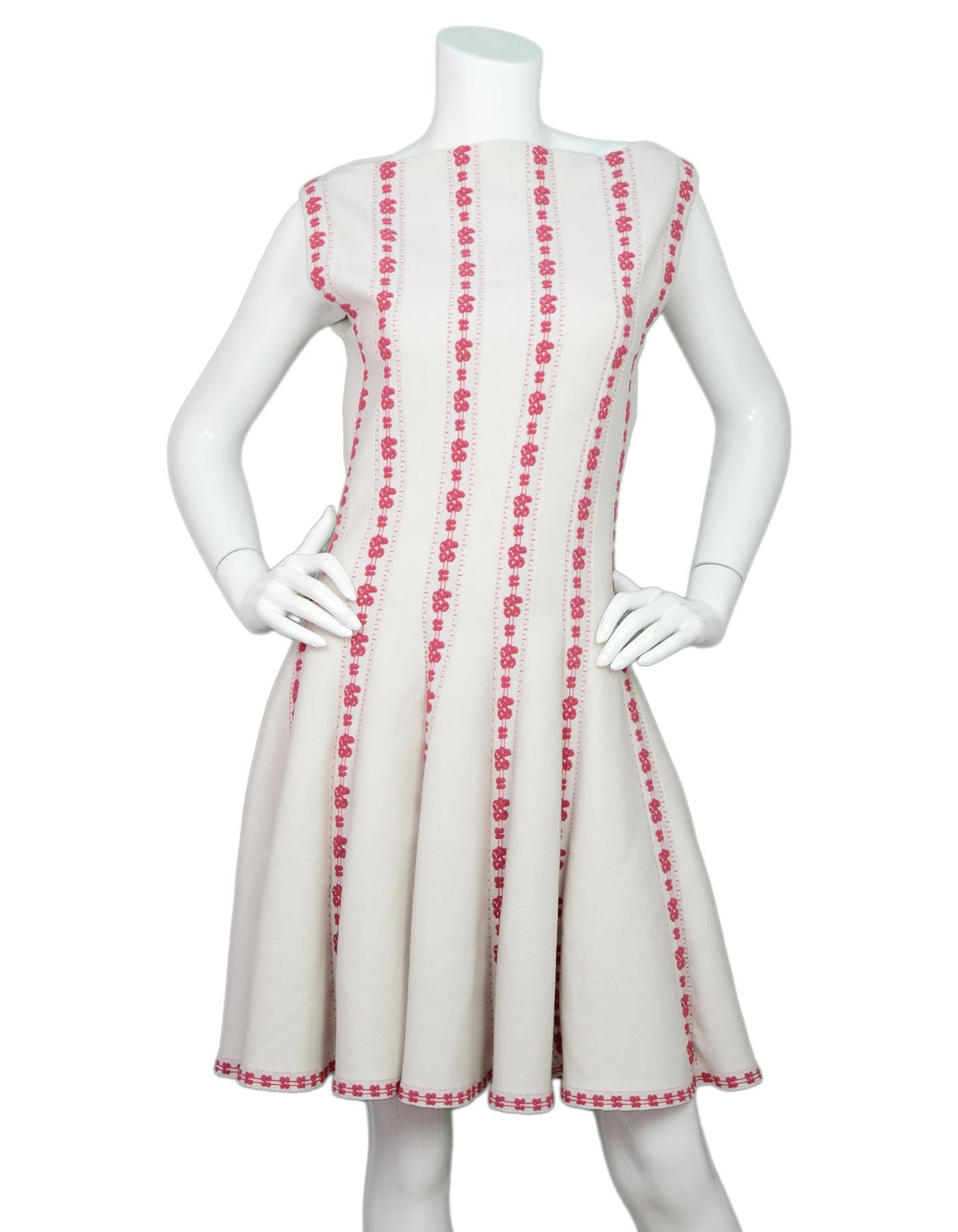 Alaia Cream & Pink Boatneck Fit & Flare Dress Sz FR44

Made in: Italy
Color: Cream, pink
Composition: 77% wool, 9% nylon, 12% polyester, 2% elastane
Lining: None
Closure/opening: Back center zip up
Overall Condition: Excellent pre-owned condition