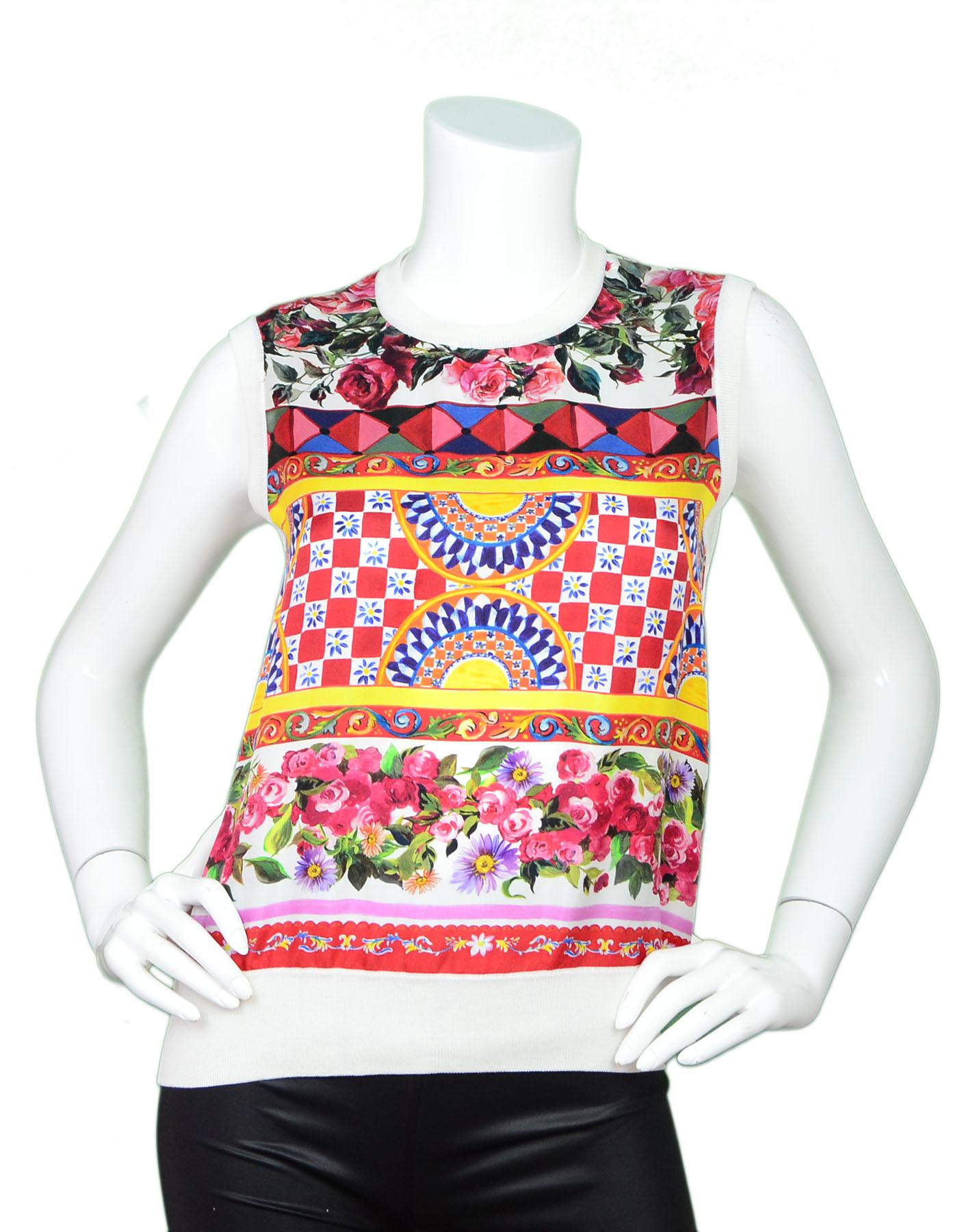 Dolce & Gabbana Silk Sleeveless Top Sz IT40

Made In: Italy
Color: Cream, multi
Composition: 100% silk
Closure/Opening: Pull over
Exterior Pockets: None
Interior Pockets: None
Overall Condition: Excellent pre-owned condition
Marked Size: IT 40 / US