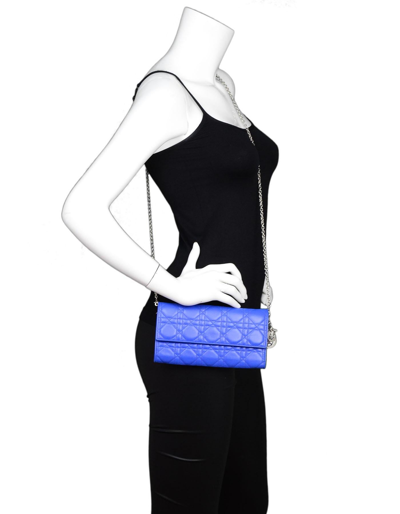 Christian Dior Cobalt Blue Cannage Quilted Rendezvous Wallet On Chain WOC

Made In: Italy
Color: Cobalt blue
Hardware: Silvertone
Materials: Lambskin leather, metal
Lining: Blue leather
Closure/Opening: Flap top with snap closure
Exterior Pockets: