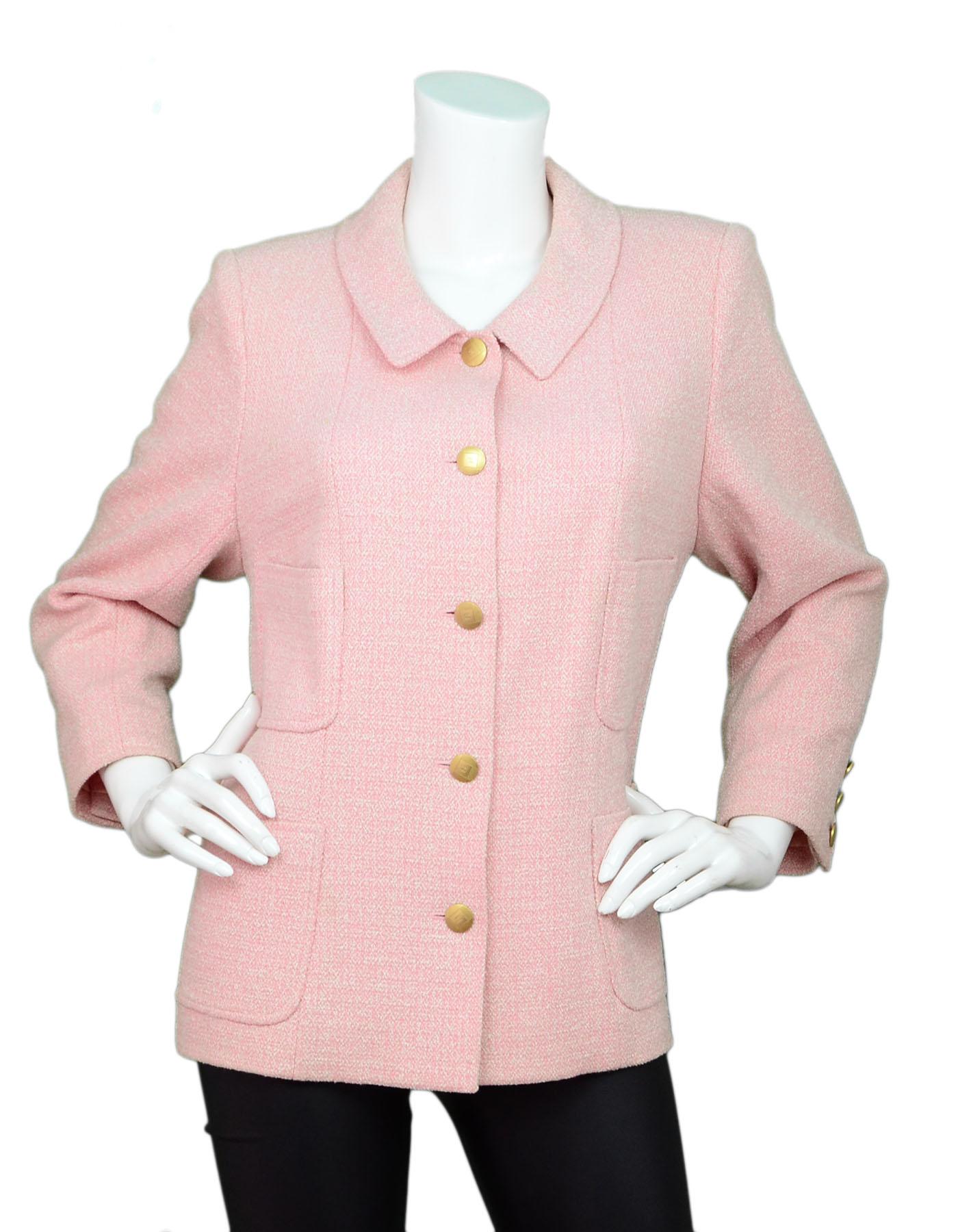 Chanel Pink & White Jacket with Goldtone CC Buttons

Color: Pink, white
Composition: Not listed, feels like cotton blend
Lining: Pink textile
Closure/Opening: Front button closure
Exterior Pockets: Four front pockets
Overall Condition: Excellent