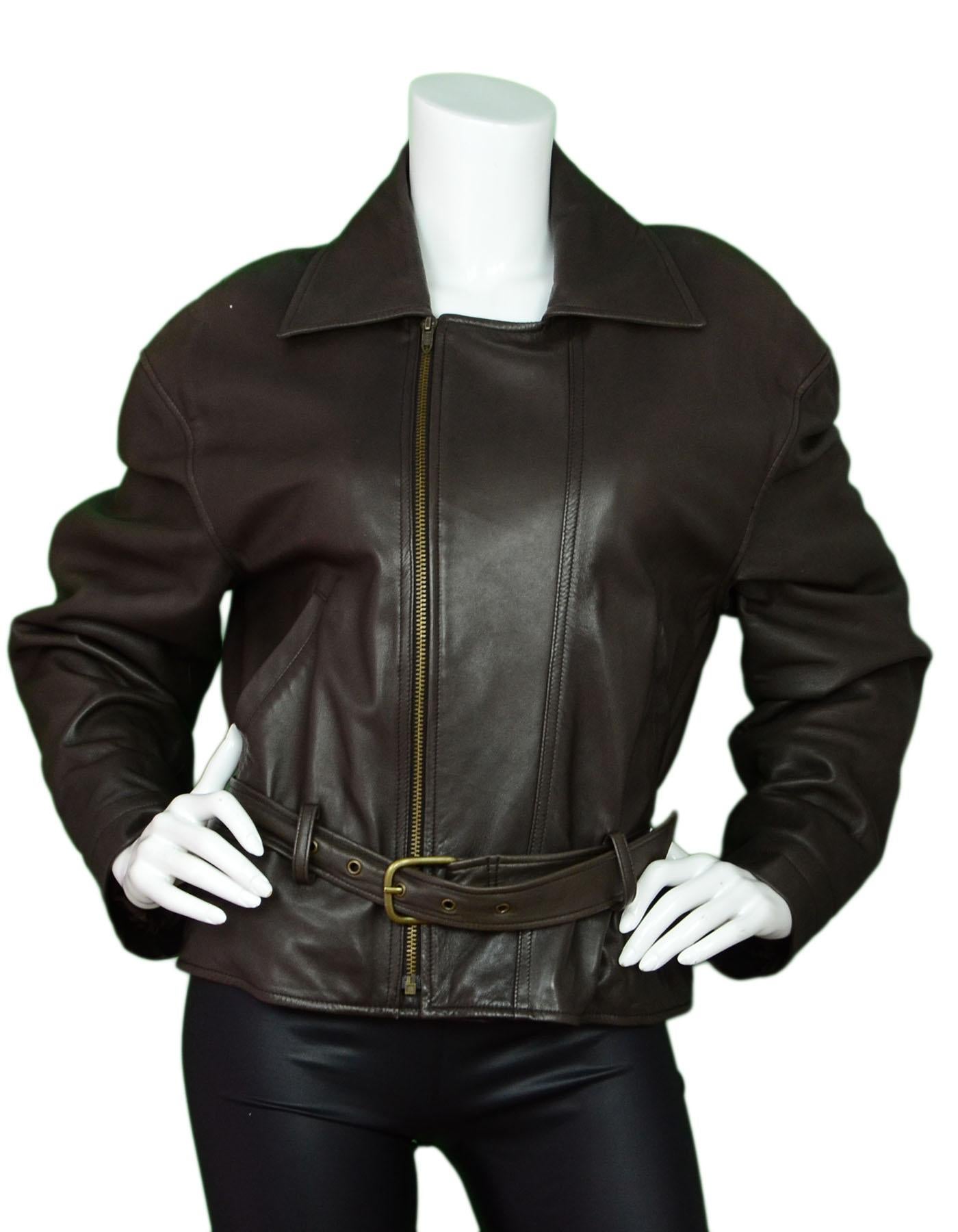 Calvin Klein Collection Brown Leather Jacket

Color: Brown
Composition: 100% leather
Closure/Opening: Front zip closure
Exterior Pockets: Side zip and slit pockets
Interior Pockets: None
Overall Condition: Excellent pre-owned condition with the