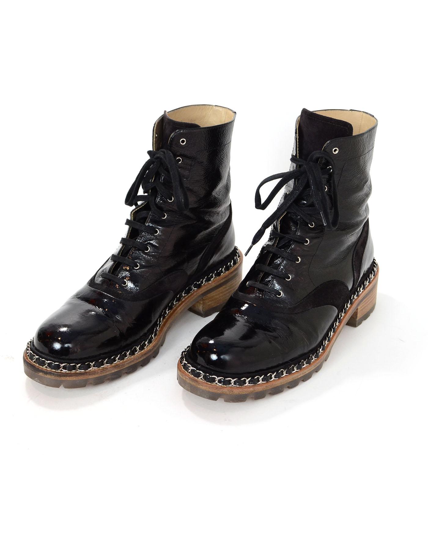 Chanel Black Patent & Chain Trim Boots Sz 40.5

Made In: Italy
Color: Black
Materials: Patent leather, suede
Closure/Opening: Lace tie closure
Sole Stamp: Chanel Made in Italy
Overall Condition: Excellent pre-owned condition with the exception of