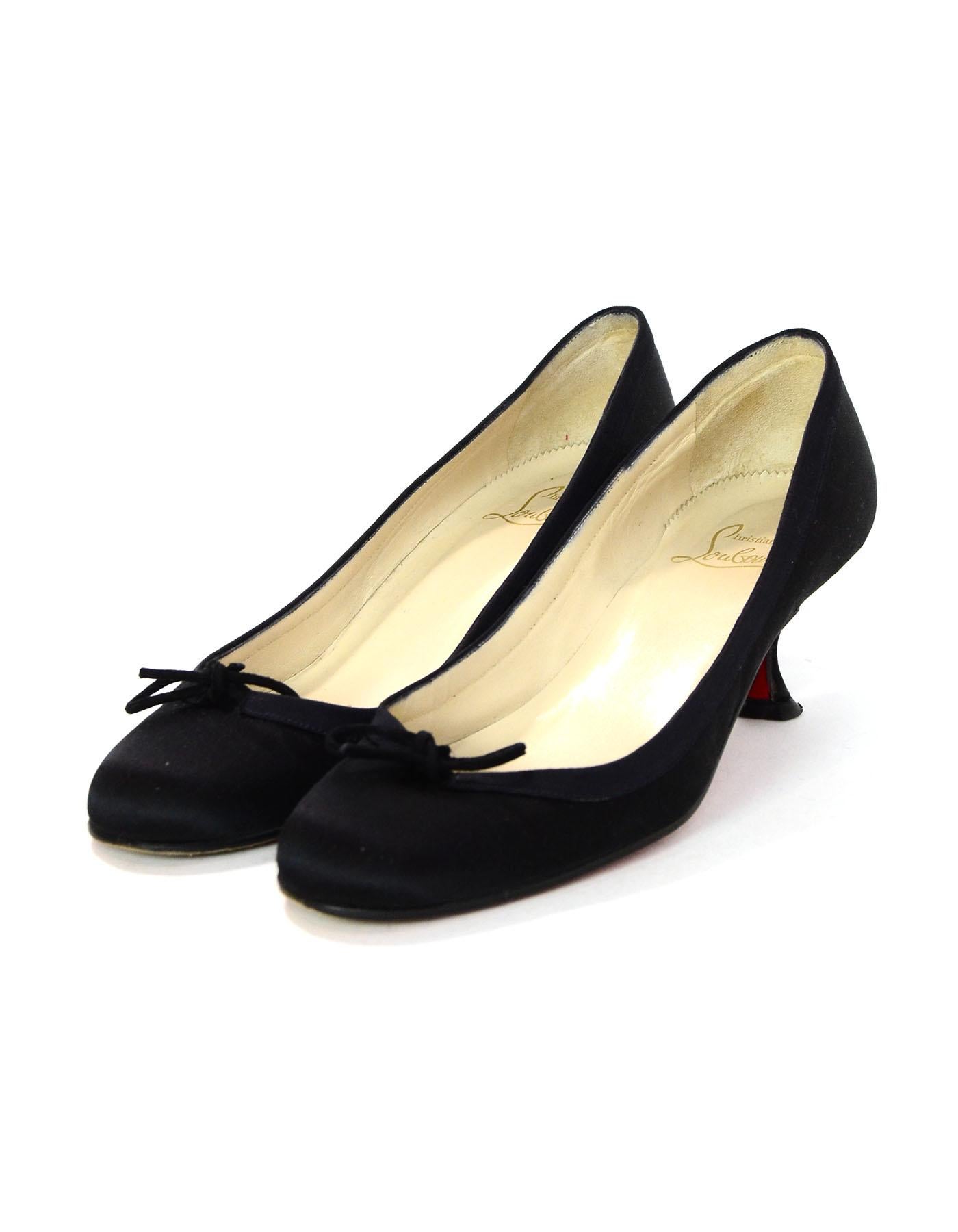Christian Louboutin Black Satin Kitten Heels Sz 39.5

Made In: Italy
Color: Black
Materials: Satin
Closure/Opening: Slide on
Sole Stamp: Christian Louboutin made in Italy 39.5
Overall Condition: Very good pre-owned condition with the exception of
