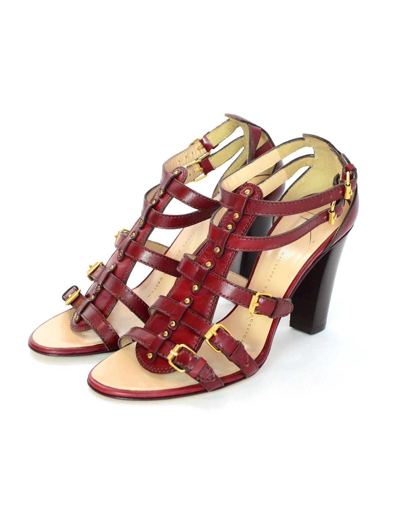 Giuseppe Zanotti Brick Red Leather Caged Sandals Sz 37.5 NEW

Made In: Italy
Color: Brick red
Materials: Leather, metal
Closure/Opening: Buckle closure at ankle
Sole Stamp: vero cuoio made in italy 37.5
Overall Condition: Excellent pre- owned