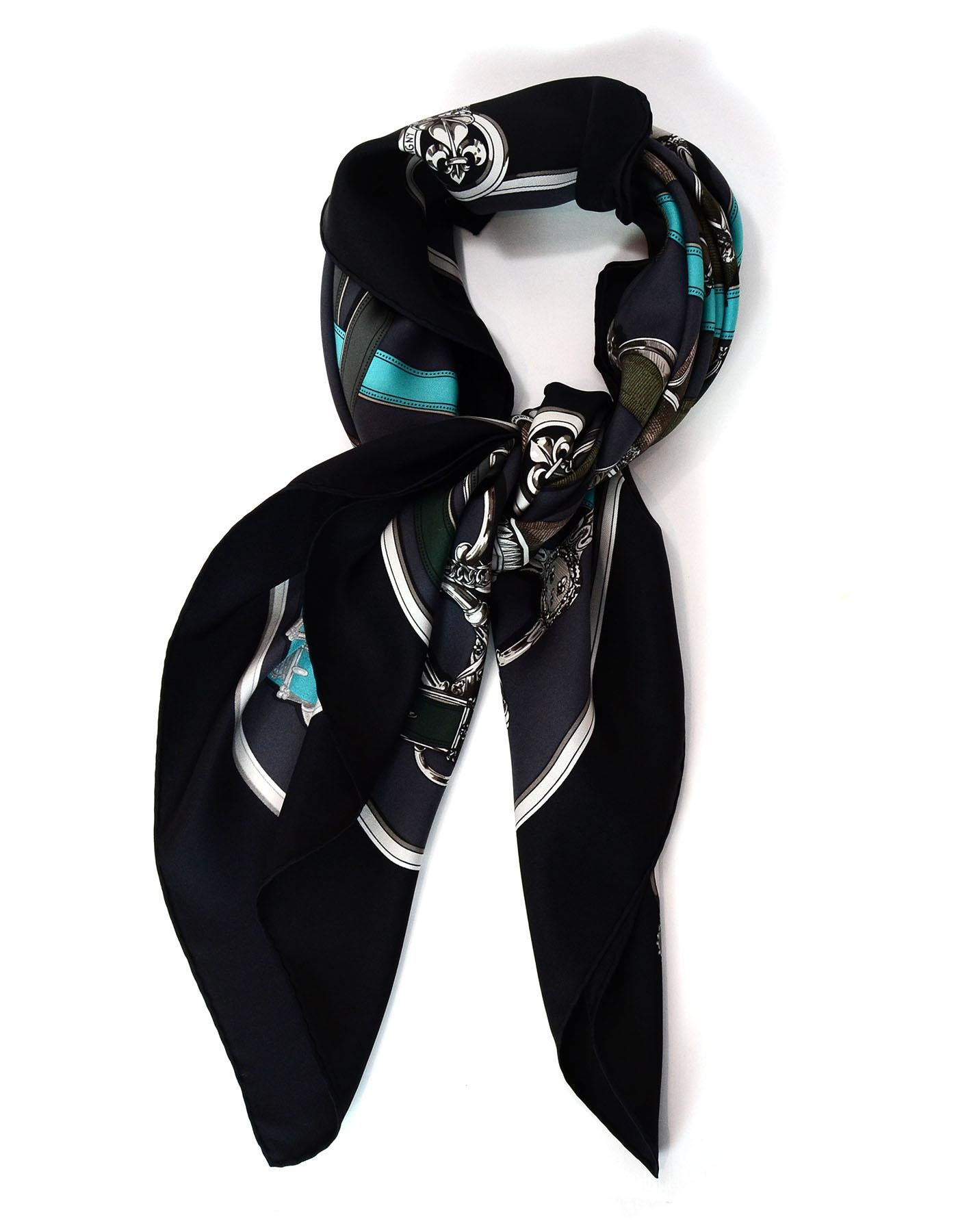 Hermes Dark Grey, Black & Blue Cavalcadour Silk 90cm Scarf

Made In: France
Color: Black, dark grey, blue
Composition: 100% Silk
Overall Condition: Excellent pre-owned condition
Included: Hermes box

Measurements:
Length: 35