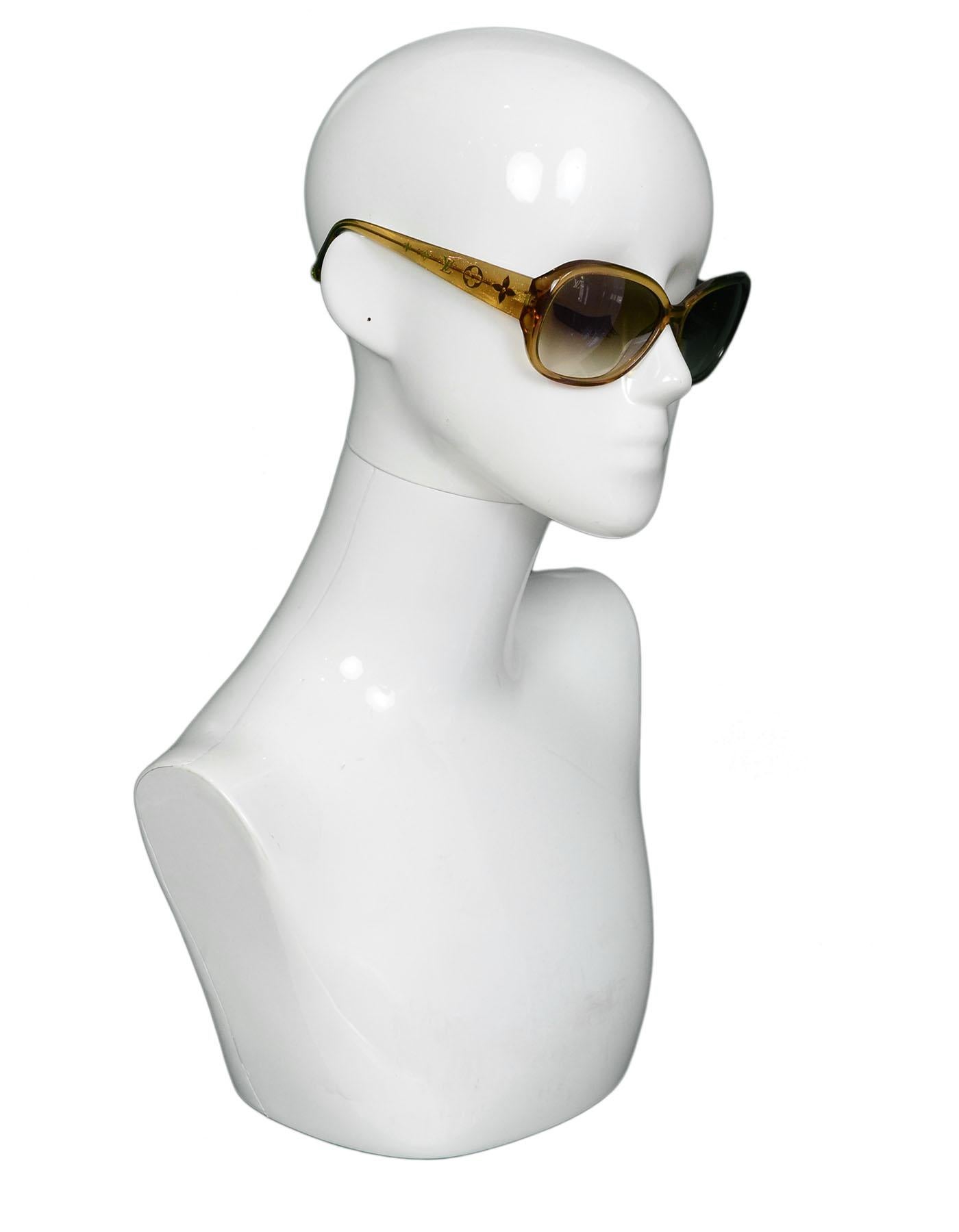 Louis Vuitton Honey Glitter Acetate Obsession GM Z0460W Sunglasses
Features fine glitter sparkles in frame and monogram at arms

Made In: Italy
Color: Honey
Materials: Resin, metal
Overall Condition: Excellent pre-owned condition with the exception