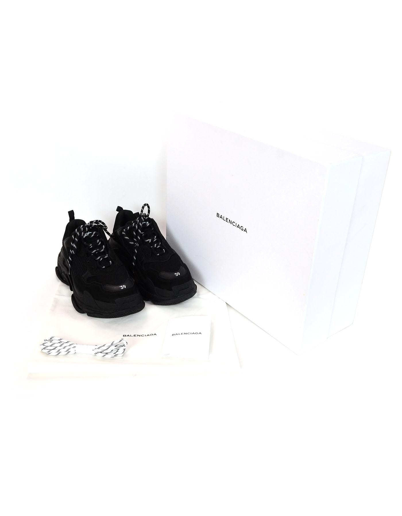 Balenciaga Black Triple S Trainers sz 39
American style oversized sneakers with black and white laces

Made In: Italy
Color: Black
Materials: Nubuck and meshes- 60% Polyester, 25% Calfskin, 15% Lambskin
Closure/Opening: Lace up
Sole Stamp: