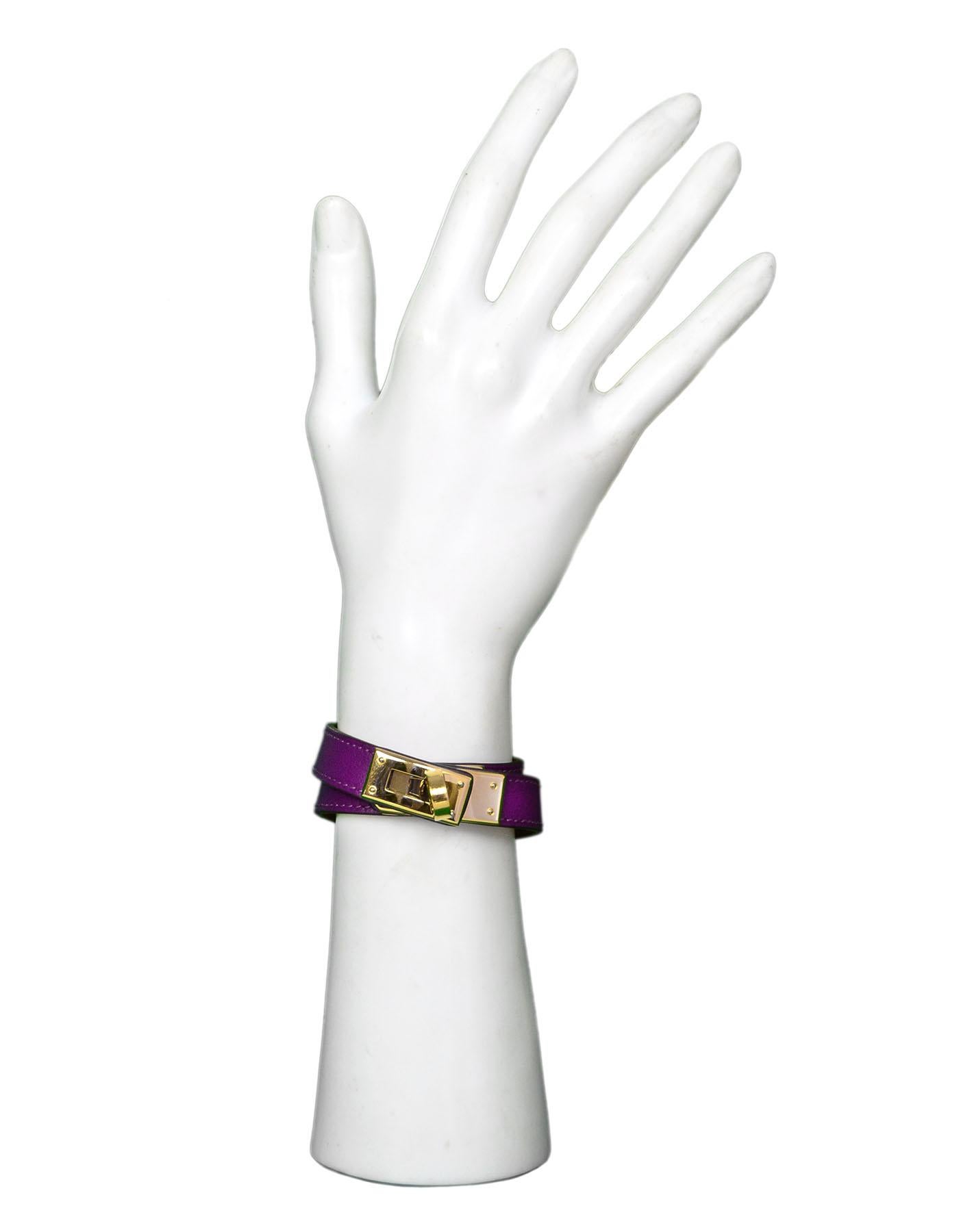 Hermes Purple Leather Kelly Double Tour Bracelet Sz S
Features Hermes classic twist lock closure with 