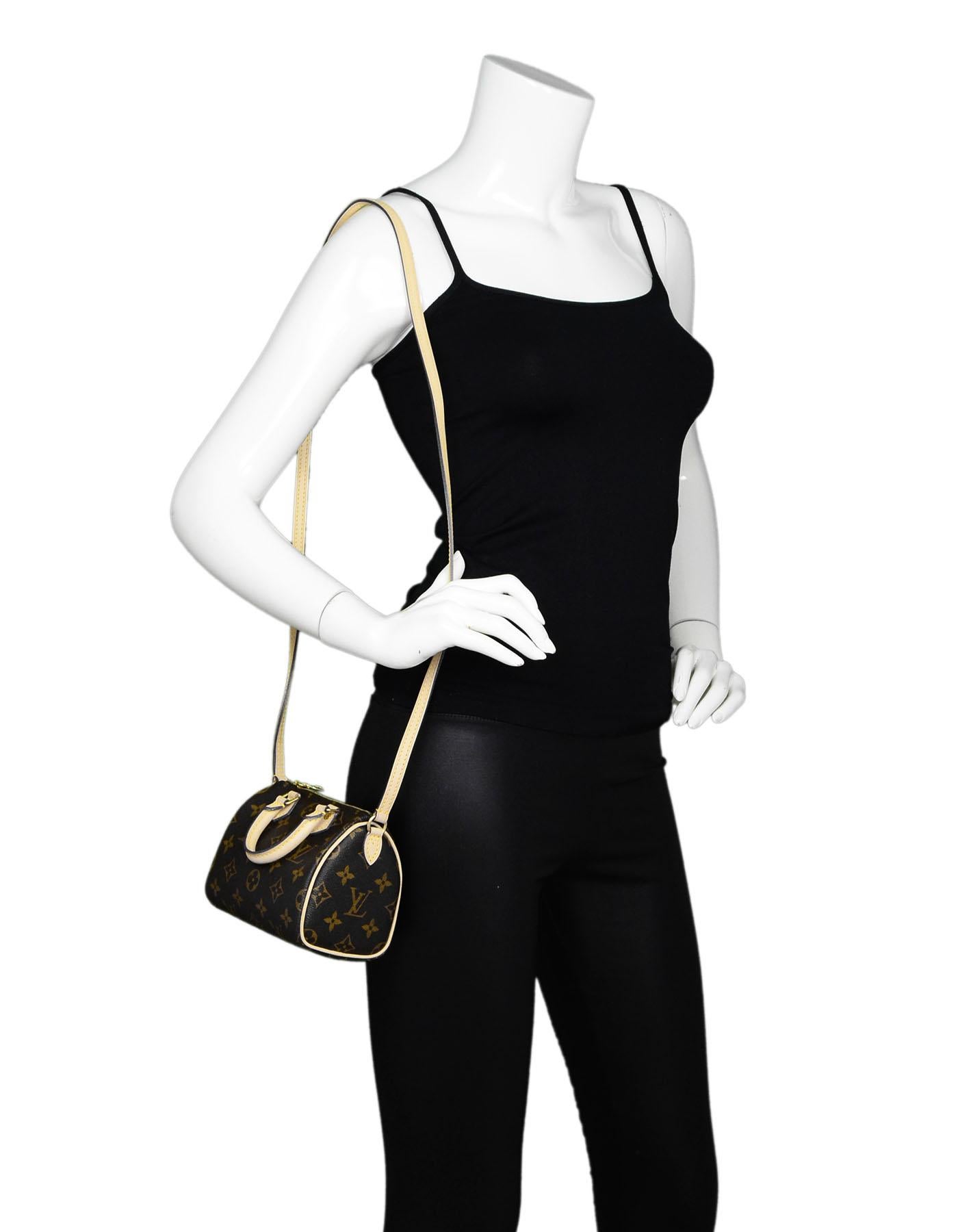 Louis Vuitton Monogram Nano Speedy Crossbody

    Made In: France
    Color: Brown
    Hardware: Goldtone
    Materials: Leather and coated canvas
    Lining: Brown canvas
    Closure/Opening: Zip across top
    Date Code: TS3177
    Exterior