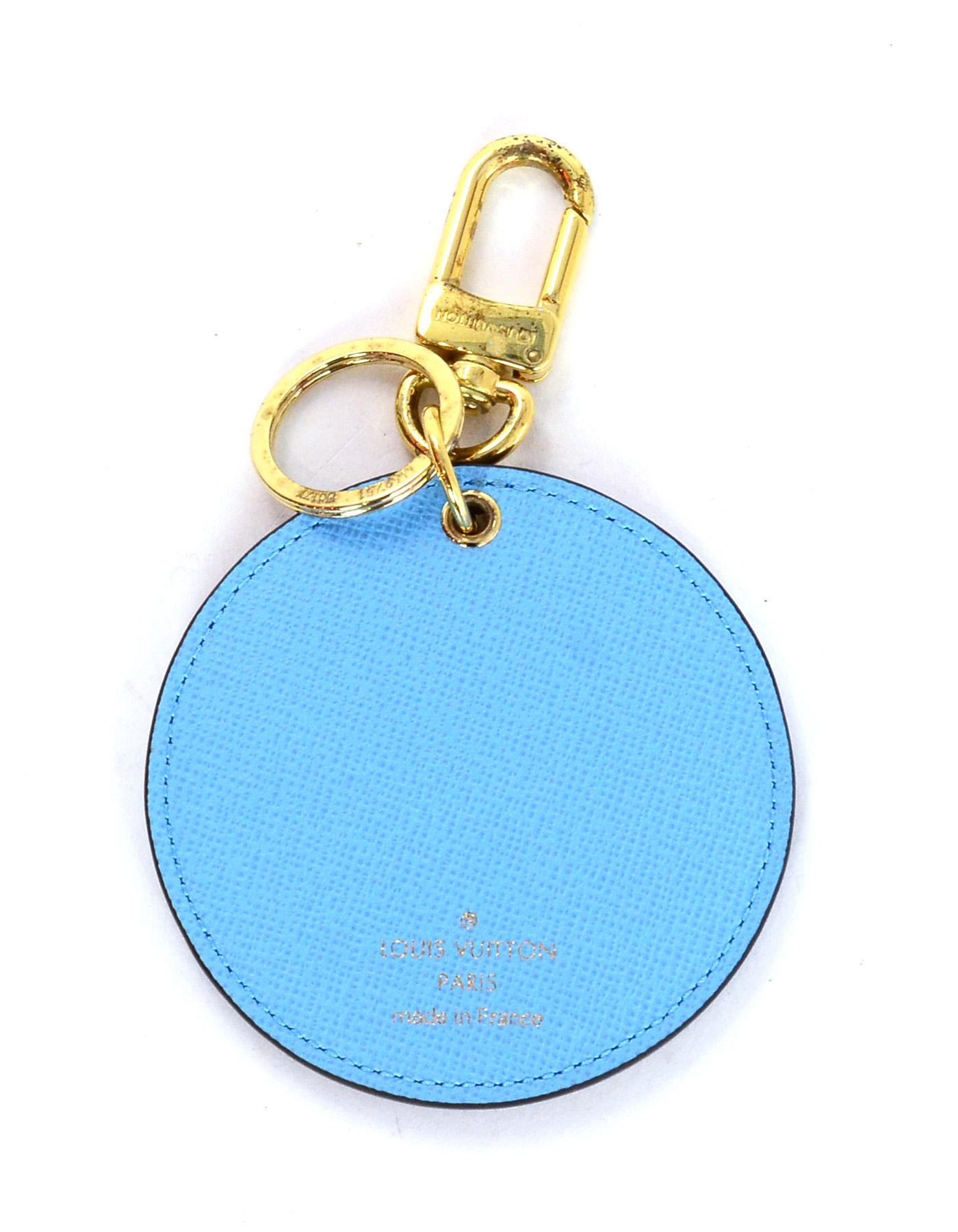 **BAG NOT INCLUDED**
Louis Vuitton Damier Ebene Illustre Manchot Bag Charm Key Ring.  This item was part of Louis Vuitton limited edition 2017 Christmas collection and features penguins carrying LV trunks and purses

Color: Brown, blue 
Materials: