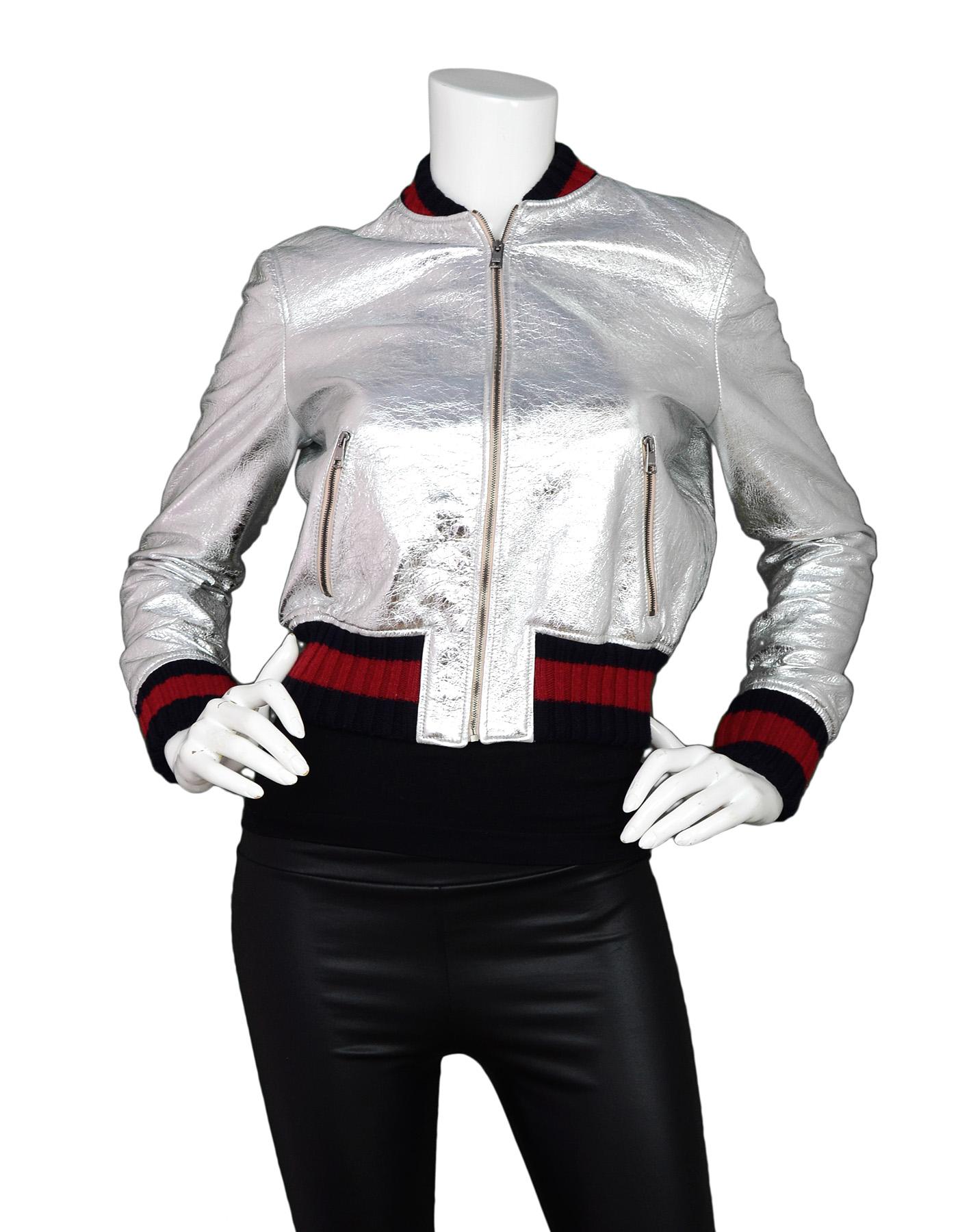 Gucci 2016 Resort Runway Crackled Silver Leather Bomber Jacket.  Features navy and red web collar and cuffs

Made In: Italy
Color: Silver, red, navy
Exterior Composition: 100% lamb leather Exterior Trim: 96% wool, 3% nylon, 1% elastane
Interior