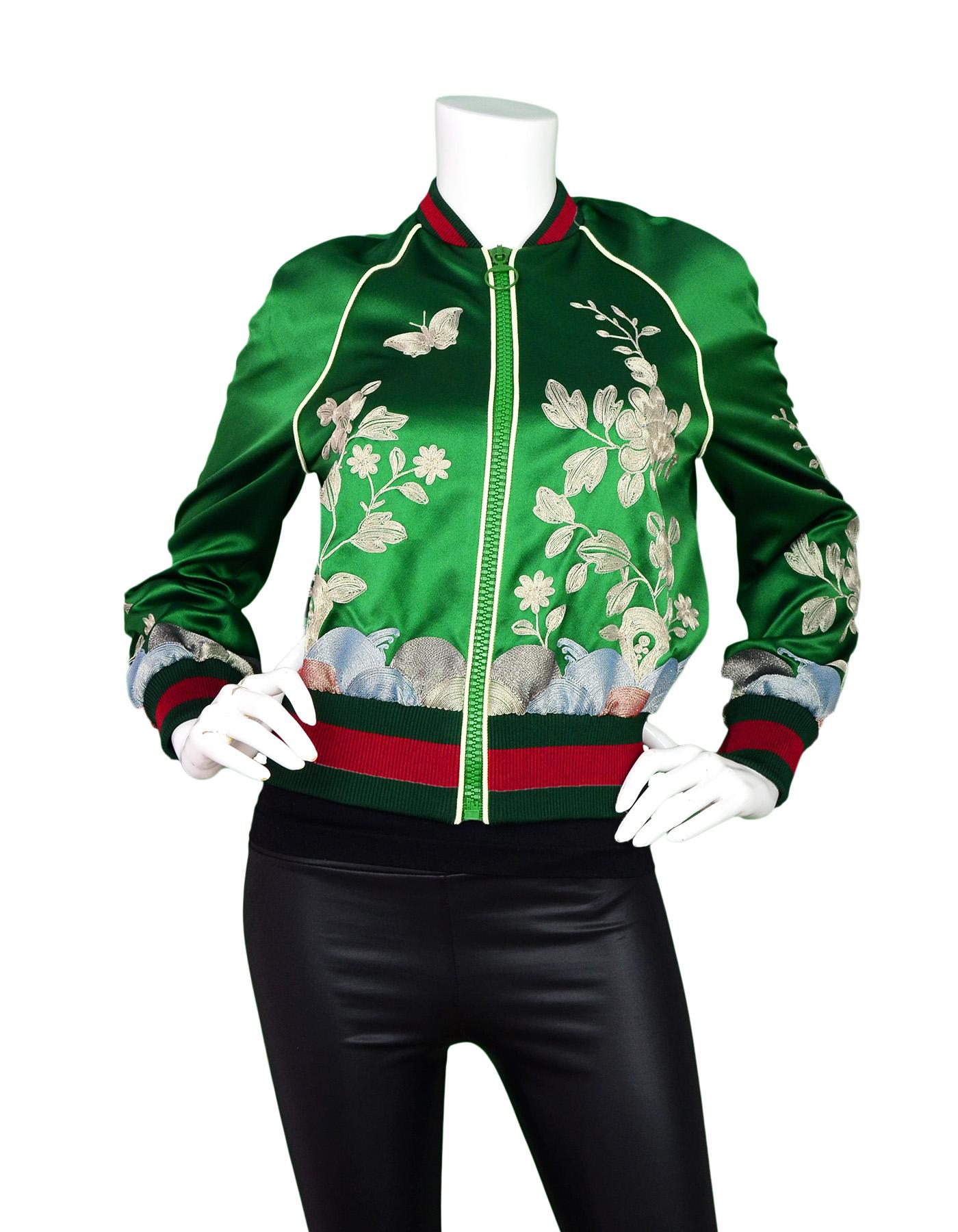 Gucci Spring 2016 Green Silk Duchesse Bomber Jacket sz 40. Features metallic embroidered floral pattern and green and red web collar and cuffs

Made In: Italy
Color: Green, metallic, red
Exterior Composition: 100% silk 
Closure/Opening: Front zip