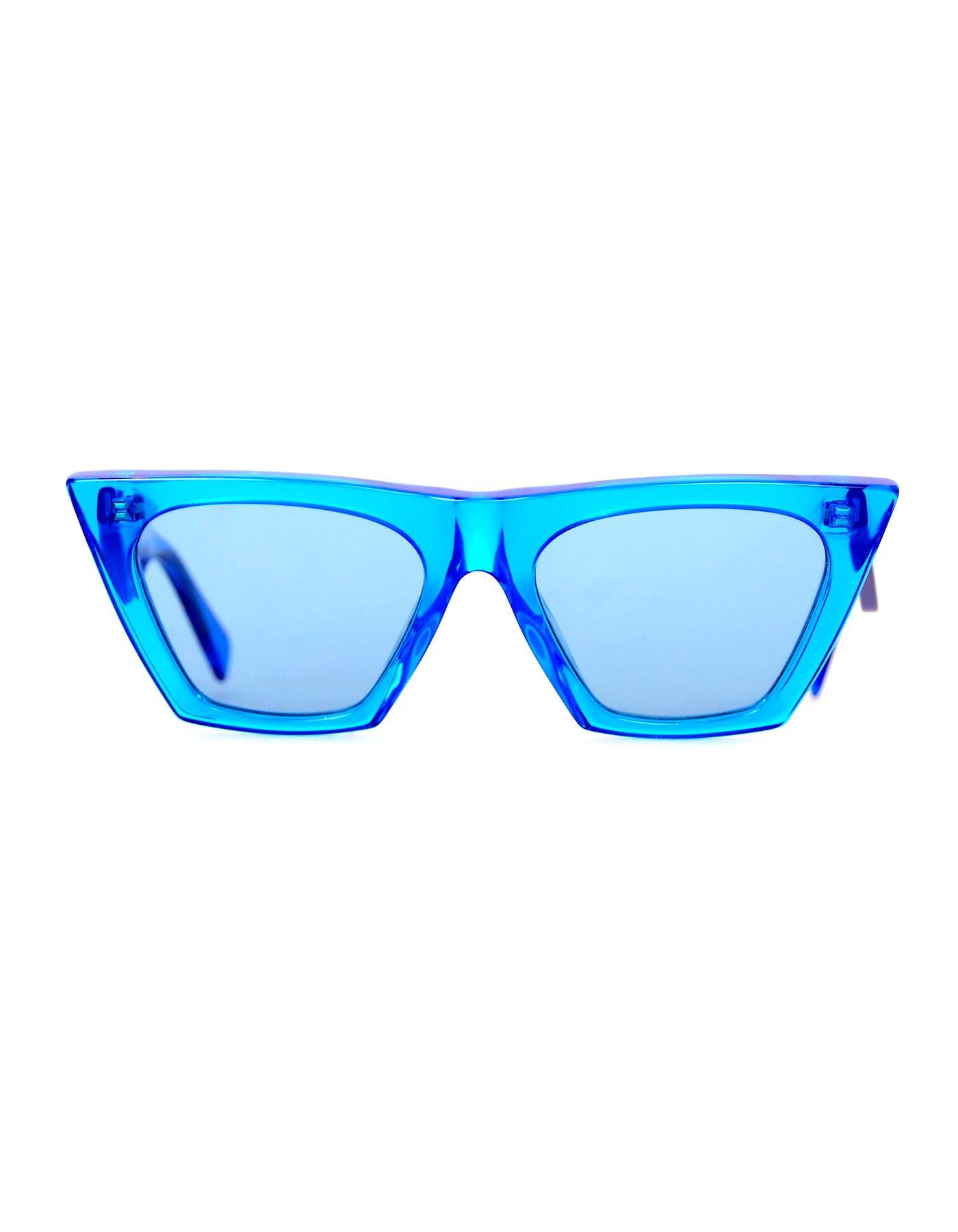 Celine Transparent Blue Edge CL41468/S Sunglasses

Made In: Italy
Color: Transparant blue
Materials: Resin
Retail Price: $375 + tax
Overall Condition: Excellent pre-owned condition
Includes: Celine case, receipt, shopping bag

Measurements: 
Length