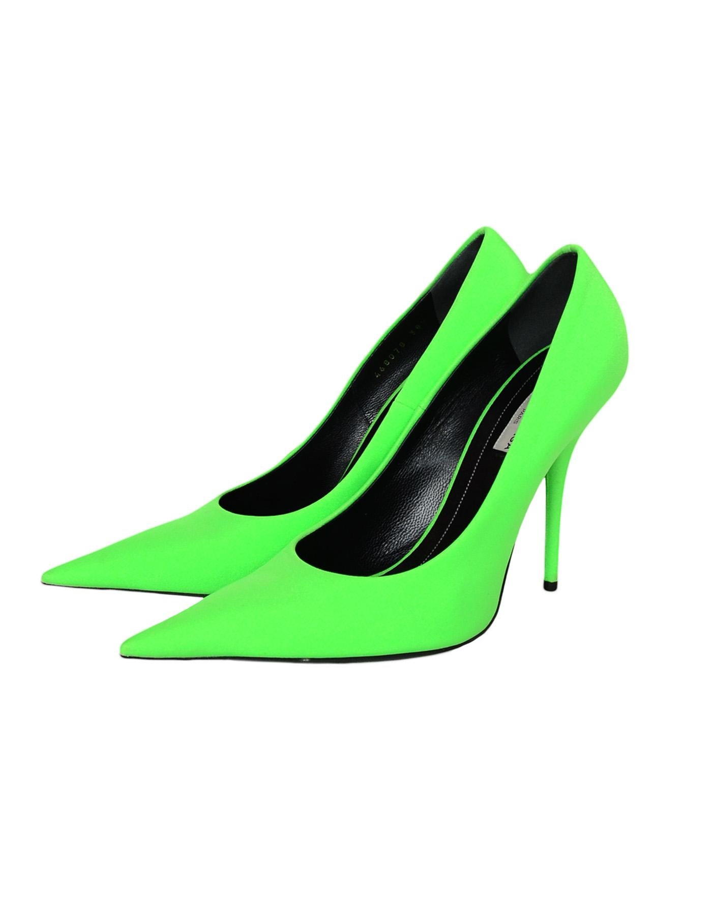 Balenciaga Neon Green Extreme Point Toe Knife Pumps

Made In: Italy
Color: Neon green
Materials: Spandex-80% Polyamide, 20% Elastan
Closure/Opening: Slide on
Overall Condition: Excellent pre-owned condition with the exception of light wear to soles