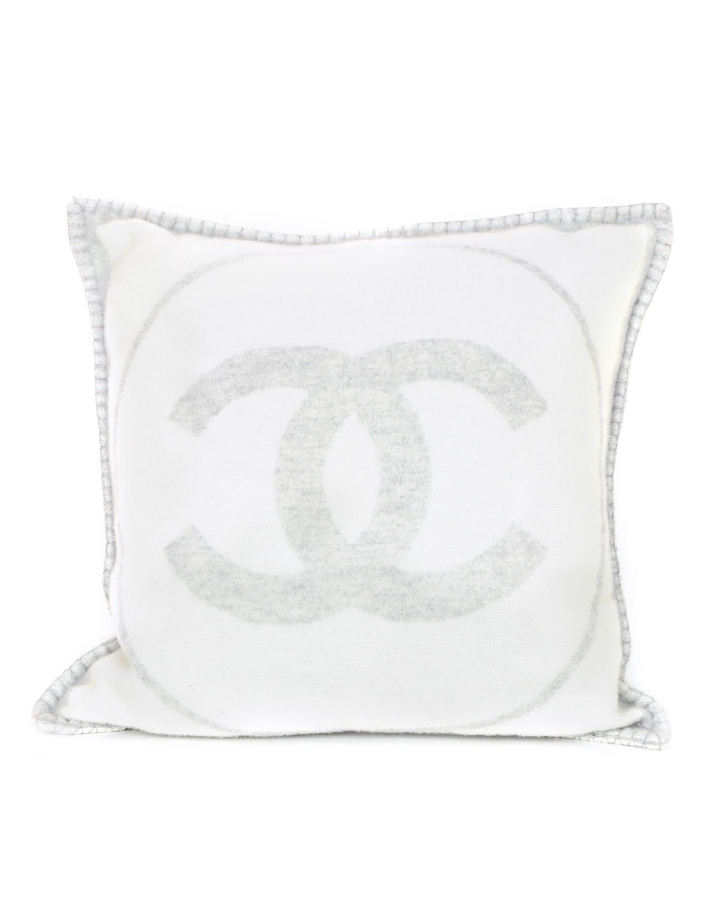 Chanel Grey/Off White Wool & Cashmere CC Square Pillow
Features CC on both sides in grey and off white

Made In: Great Britian
Color: Navy and ivory
Composition: 90% wool, 10% cashmere
Pillow Lining: 100% cotton
Pillow Filling: 100% Duck