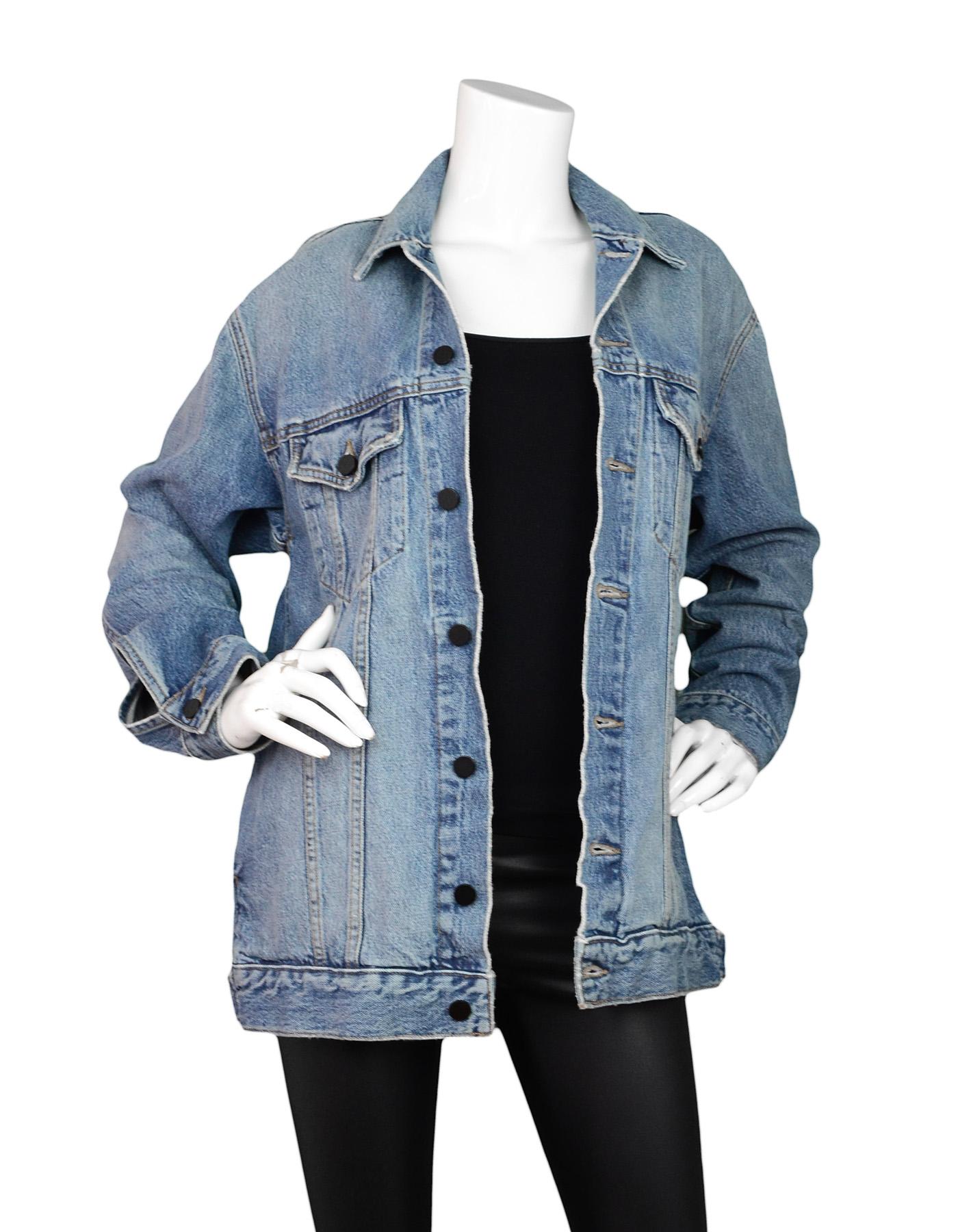 Alexander Wang Blue Daze Oversized Denim Jacket 

Made In: USA
Color: Distressed blue 
Composition: Outer- 100% cotton / Pocketing/pouches-65% cotton 35% polyester
Lining: None
Closure/Opening: Button closure 
Exterior Pockets: Two button patch