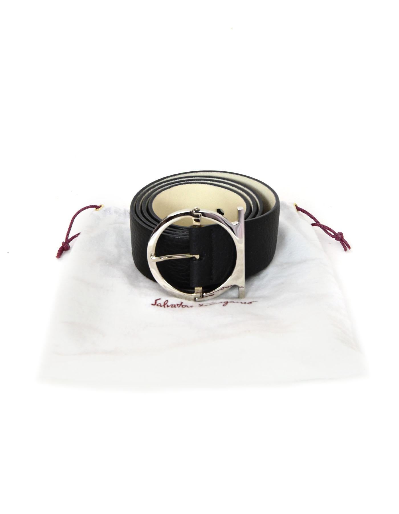 Ferragamo Black/Silver Leather Gancio Belt

Made In: Italy
Materials: Textured leather, metal
Colors: Black, cream, silvertone
Overall Condition: Excellent pre-owned condition, light tarnishing to metal
Includes: Ferragamo dustbag

Measurements: