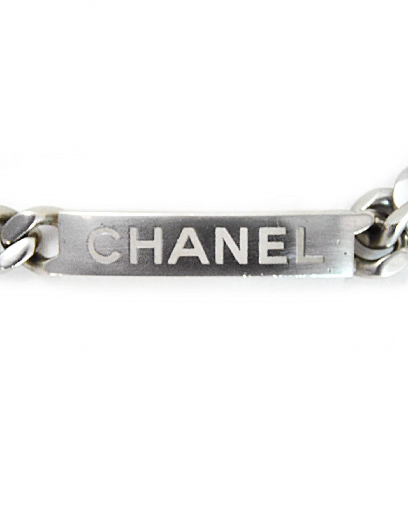 Chanel Silvertone ID Chain Necklace. Features CC charm at end of chain.

Made In: Italy
Color: Matte silvertone
Materials: Metal
Closure: Lobster clasp closure
Stamp: Chanel B15 P MADE IN ITALY
Overall Condition: Very good pre-owned condition. Nicks