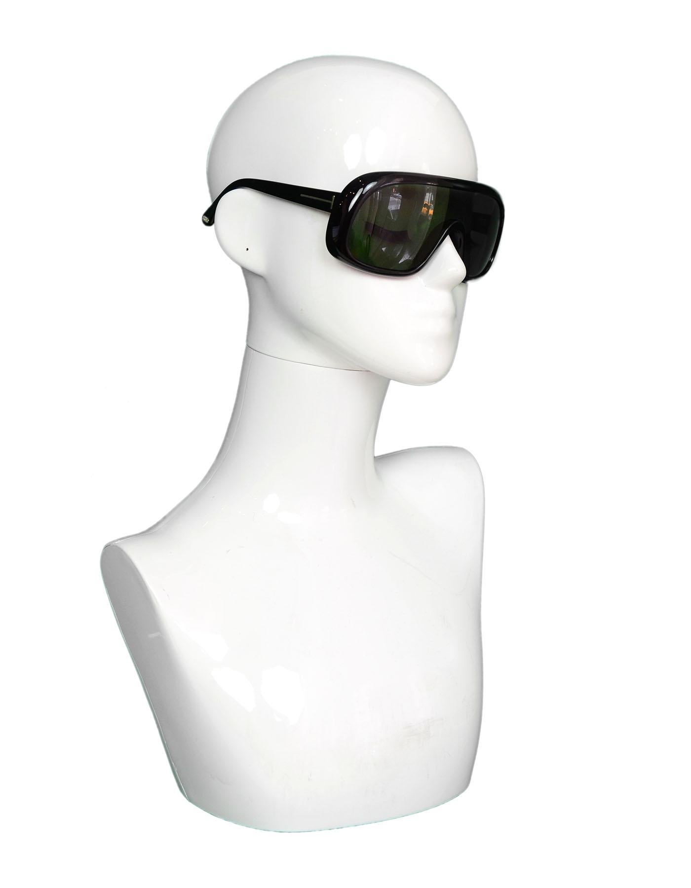 Tom Ford Black Sven Shield Green Tint Moto Unisex Sunglasses. Includes Case And Cleaning Cloth.

Made In: Italy 
Color: Black and green
Hardware: Goldtone
Overall Condition: 
Estimated Retail: $385 + tax
Includes:  Tom Ford case and cleaning cloth