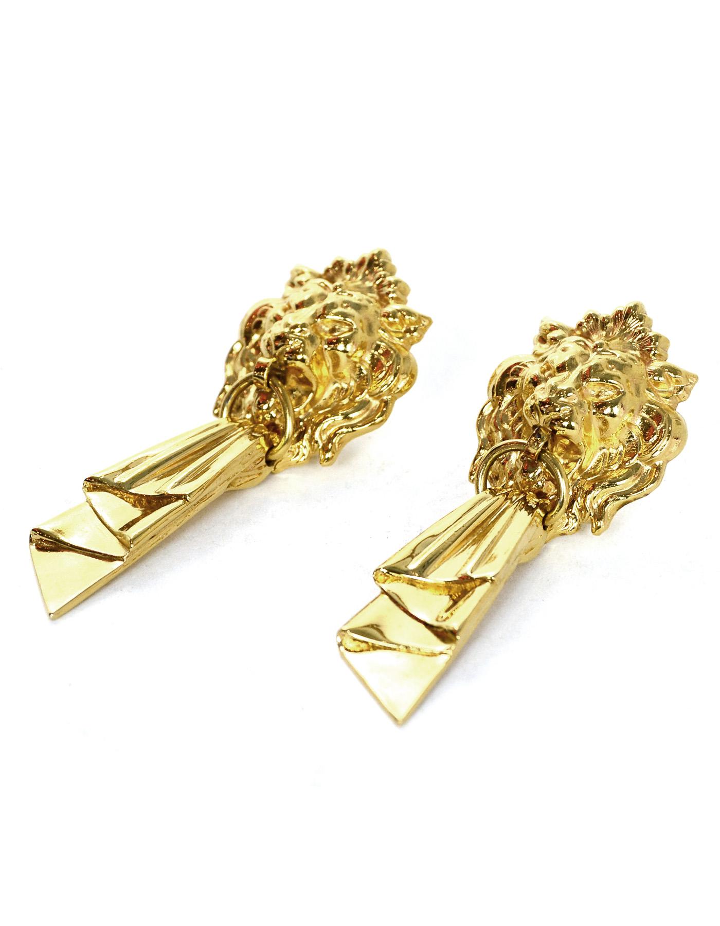 Chanel Vintage Classic Goldtone Lionhead Dangle Clip-on Drop Earrings

Color: Goldtone
Materials:  Goldtone metal
Hallmarks: Chanel hallmark on back on one earring clip
Closure/Opening:   Clip-On
Overall Condition: Excellent vintage condition with