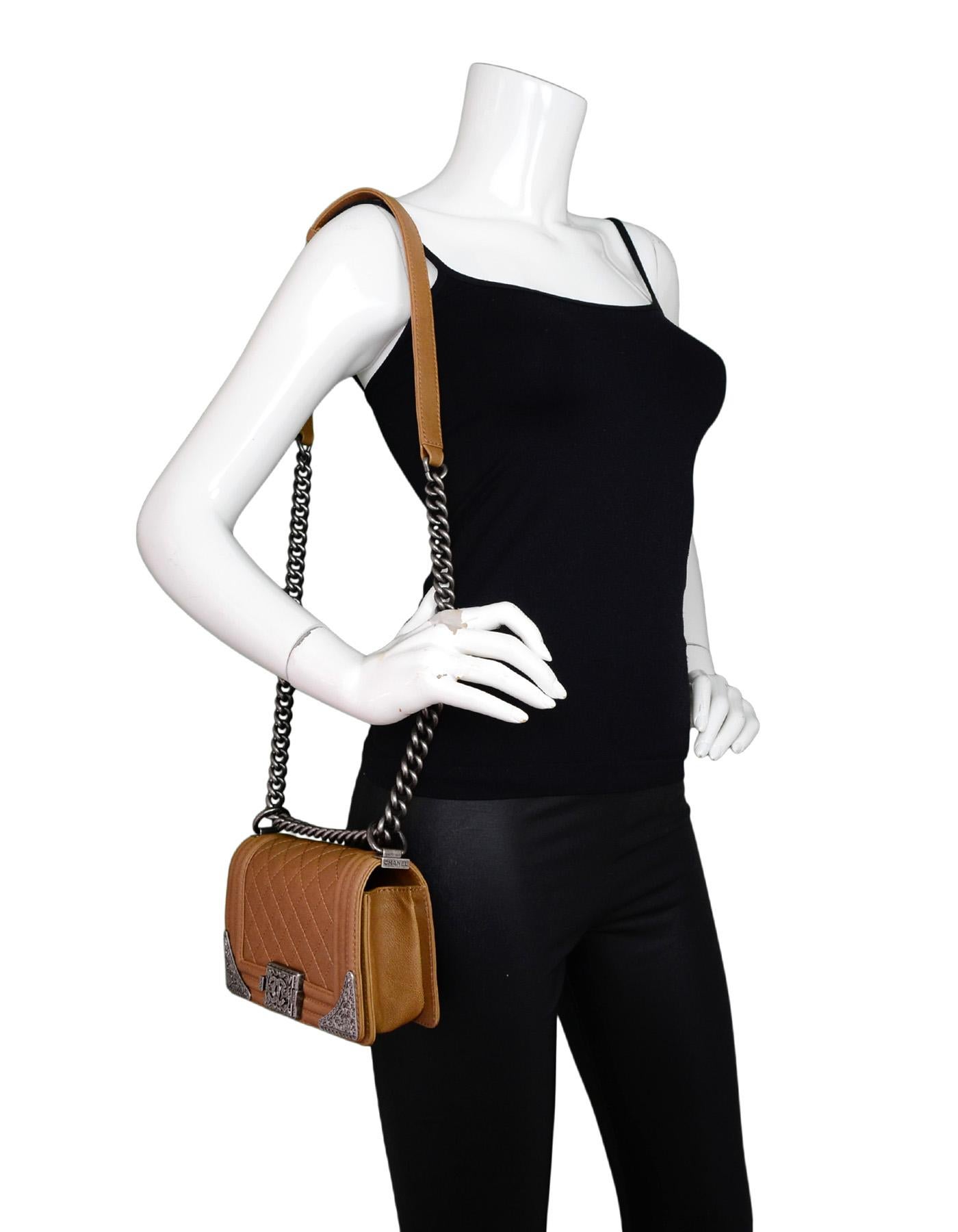 Chanel Brown Calfskin Leather Quilted Paris/Dallas Small Cowboy Crossbody Shoulder Bag With Antiqued Silvertone Hardware, 2014

Made In: France
Year of Production: 2014
Color: Brown
Hardware: Antiqued silvertone
Materials: Calfskin leather 
Lining: