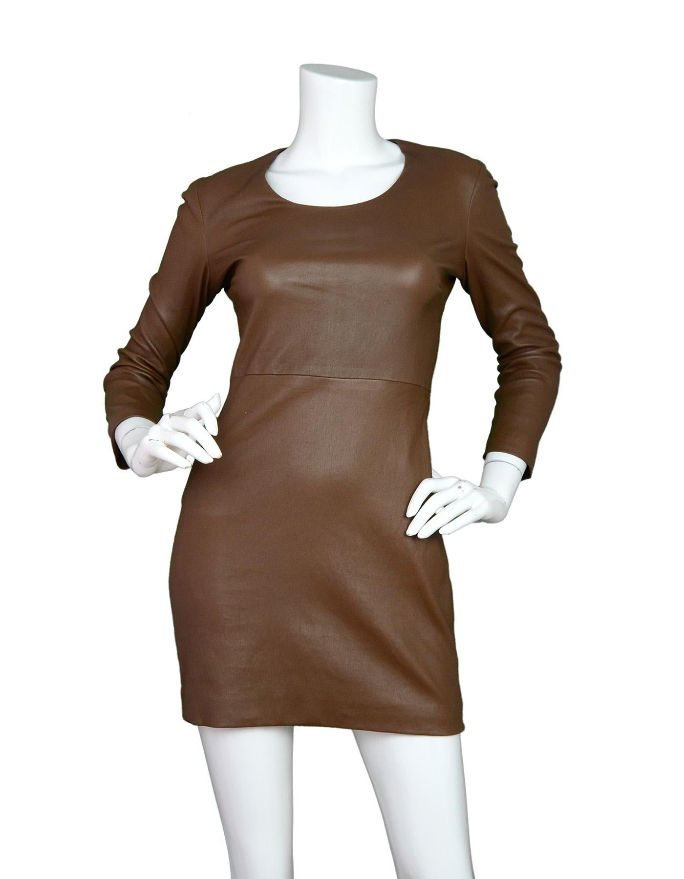 The Row Tobacco Leather Long Sleeve Scoop Neck Dress Sz S

Made In:  USA
Color: Tobacco brown
Materials: Shell: 100% lamb skin leather applied to 97% cotton, 3% Elastic
Lining: 95% Silk, 5% elastic 
Opening/Closure: Hidden back zipper
Overall