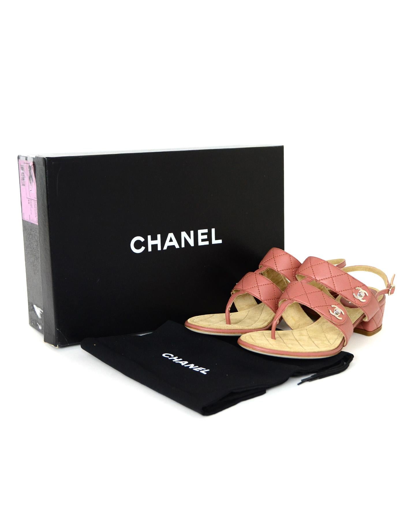 Chanel Dark Blush Calfskin Leather Quilted CC Turnlock Thong Heeled Sandals Sz 38 New

Made In: Italy
Year of Production: 2011
Color: Dark blush
Hardware: Silvertone
Materials: Calfskin leather
Closure/Opening: Sling back with adjustable buckle