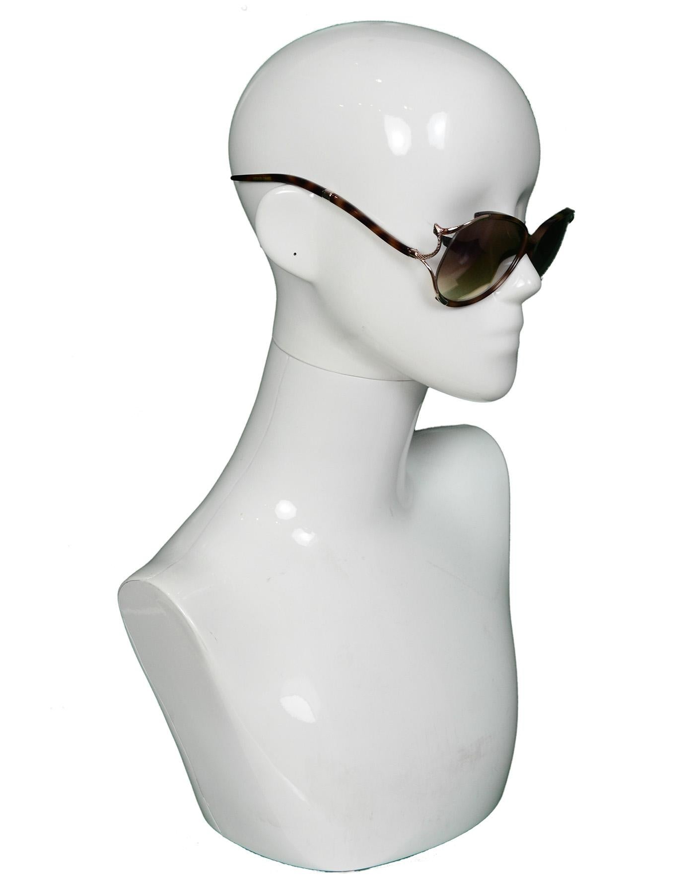 Roberto Cavalli Havana Brown Hamal Sunglasses WIth Goldtone Snake Sides

Made In: Italy
Color: Havana brown
Hardware: Goldtone
Materials: Acetate and metal
Overall Condition: Excellent pre-owned condition 
Estimated Retail: $360 + tax
Includes: 