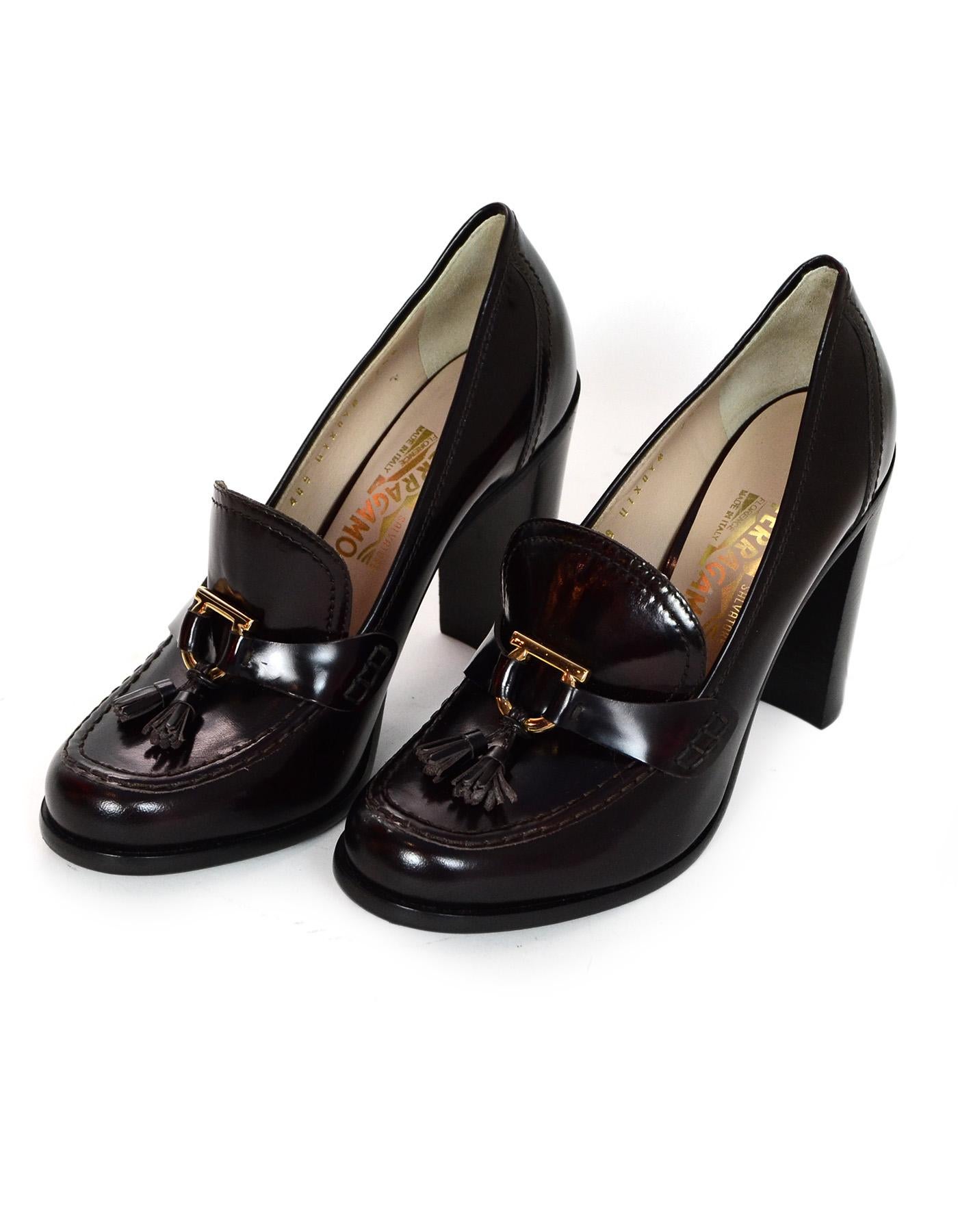 Salvatore Ferragamo Burgundy Glazed Leather Tassel Heeled Loafers Sz 7.5B

Made In: Italy
Color: Burgundy and black
Hardware: Goldtone
Materials: Glazed leather 
Closure/Opening: Slip on 
Overall Condition: Like new condition 

Measurements: 
Marked