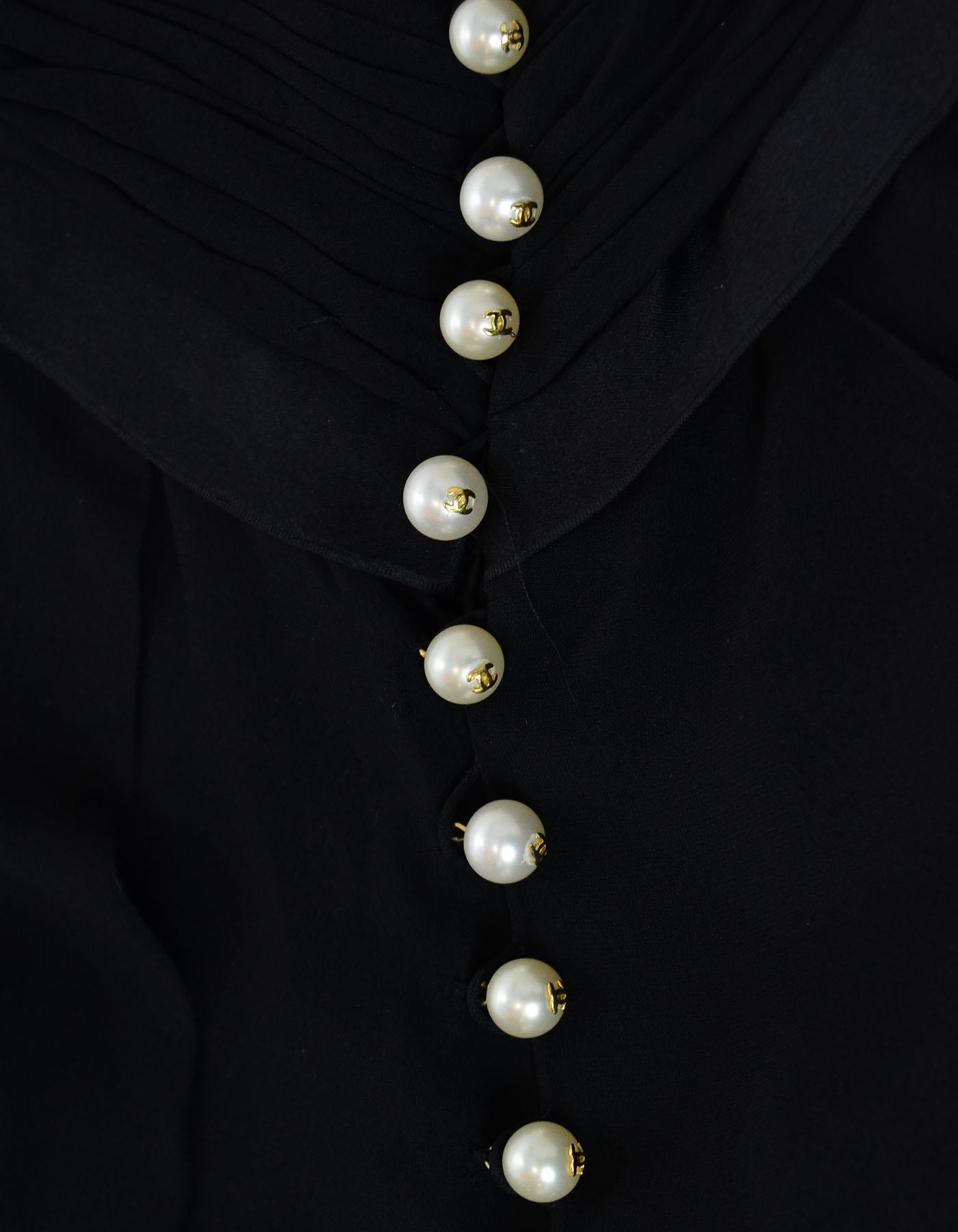 Chanel Black Silk Vintage Gown With Ruched Top and Side Bow W/ 13 CC Pearl Button Back Sz 38

Made In: France
Color: Black
Materials: 100% silk
Lining: 100% silk
Opening/Closure: 13 Chanel logo pearl buttons on back 
Overall Condition: Excellent
