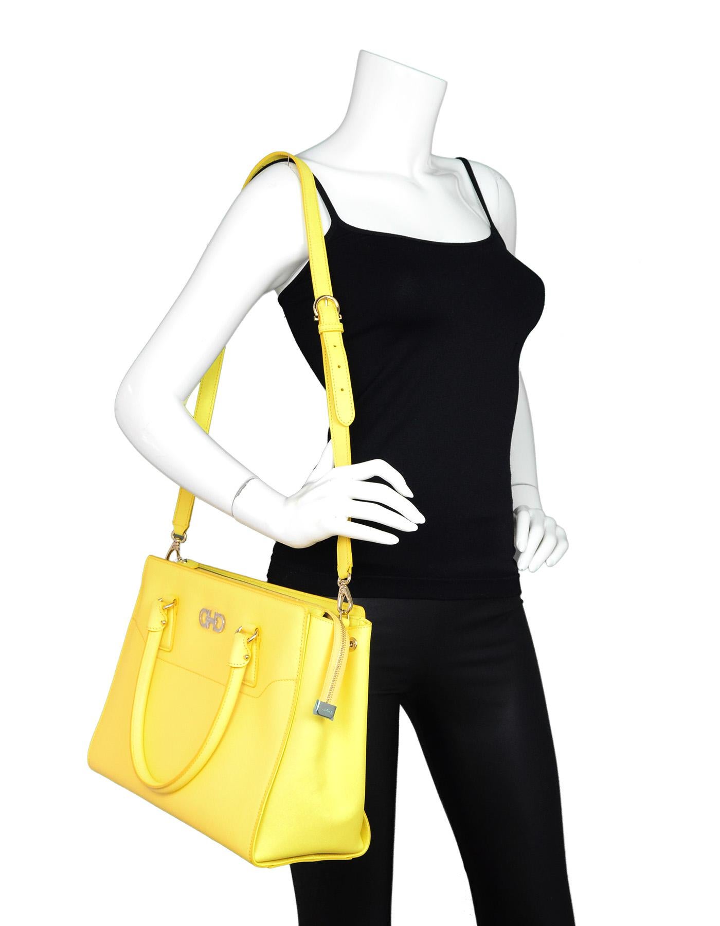 Salvatore Ferragamo New Mimosa Yellow Large Gianco Beky Saffiano Textured Leather Double Shoulder Handle Tote Bag W/ Crossbody Strap. Includes Tags And Dust Bag.

Made In: Italy
Color: Mimosa yellow
Hardware: Goldtone
Materials: Saffiano