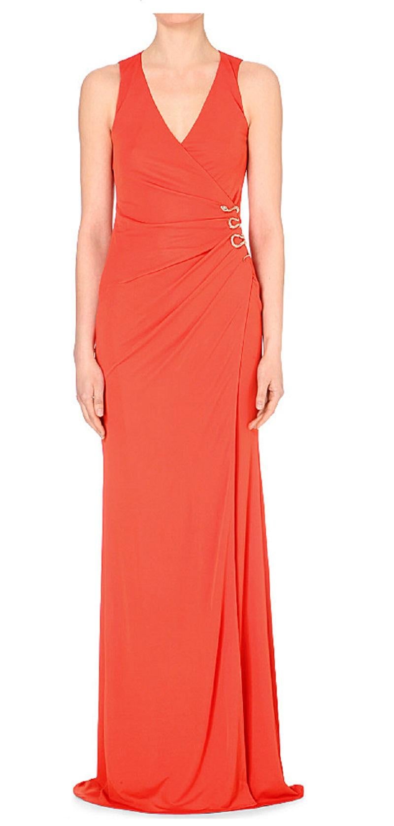 Roberto Cavalli Orange Jersey Gown with Goldtone Side Snake Detail 
Made In: Italy Color: Orange
Materials: 100% rayon 
Lining: 100% rayon
Opening/Closure: Hidden side zip
Overall Condition: Excellent pre-owned condition, with the exception of minor