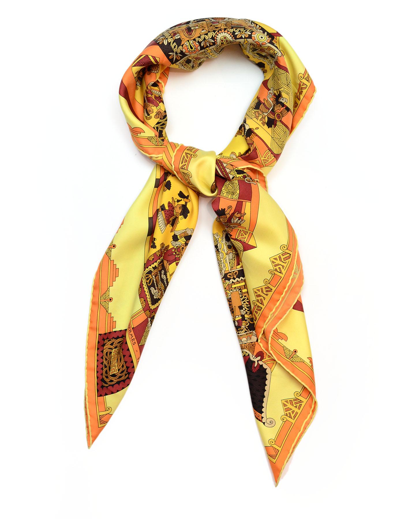 Hermes Yellow Astres Et Soleils Silk Scarf

Made In: France
Color: Yellow, brown, patterned 
Materials: 100% silk
Overall Condition: Excellent pre-owned condition 

Measurements: 
36